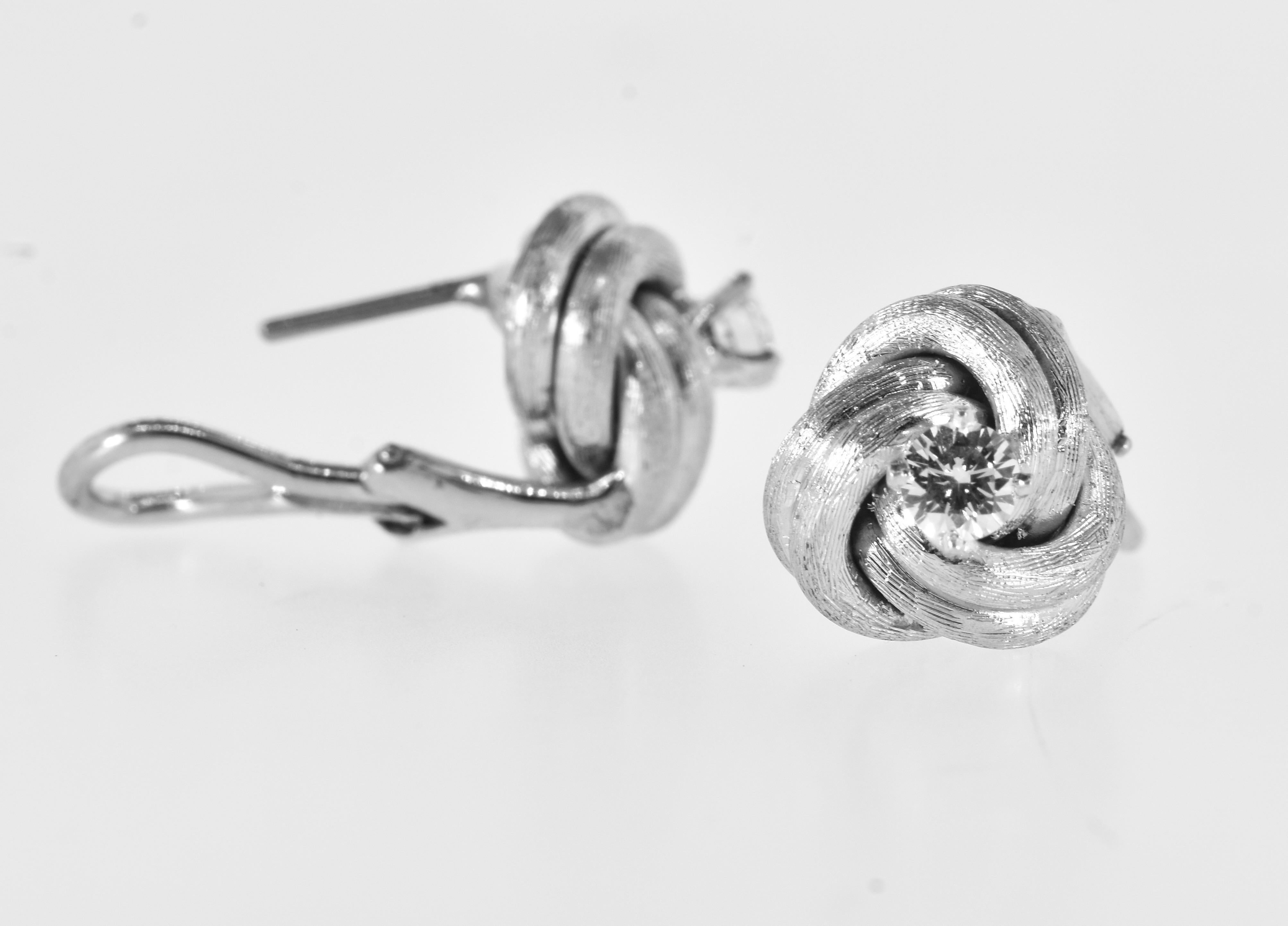Women's Diamond Ear Stud White Gold Medium Size Earrings in a Love Knot Motif. For Sale
