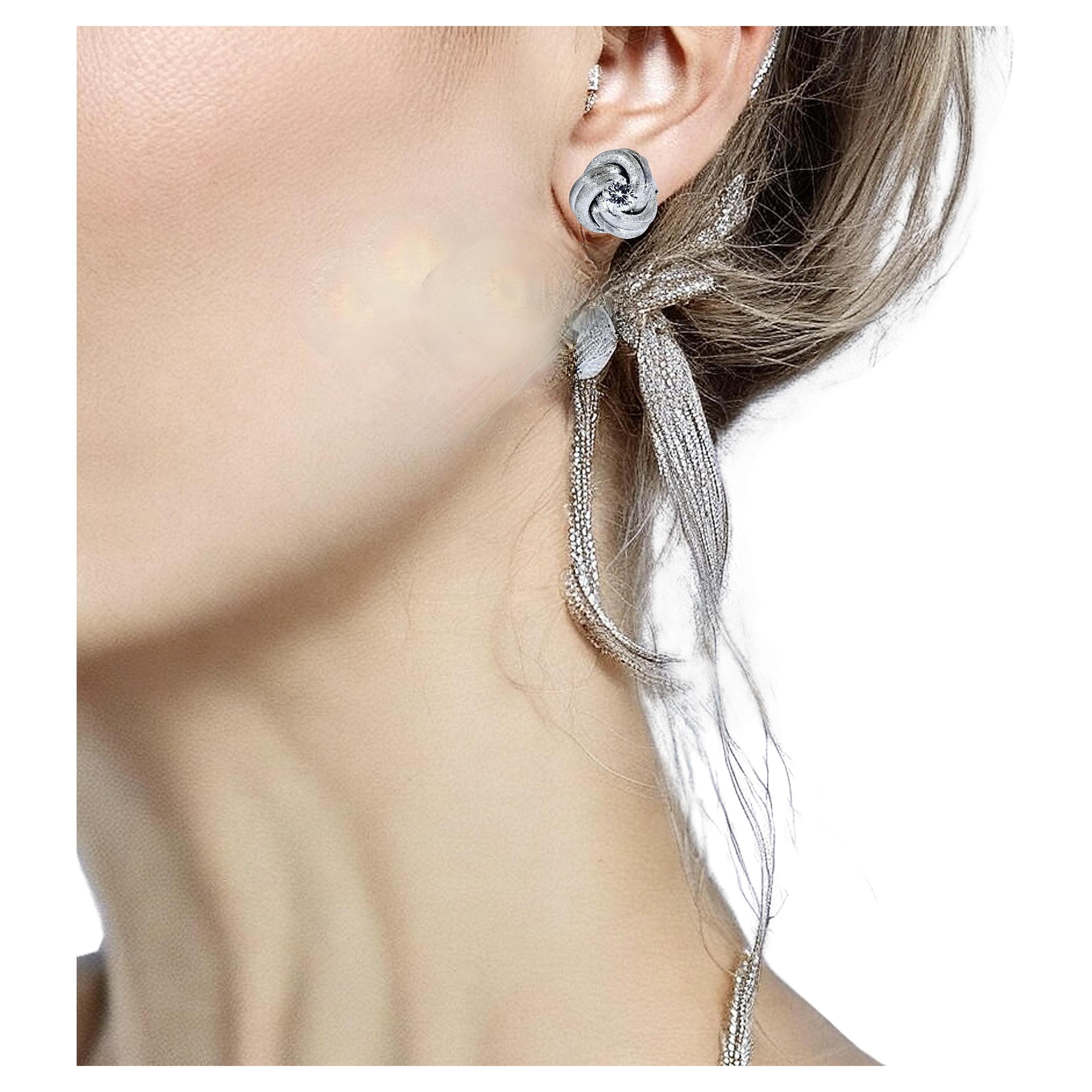 Diamond Ear Stud White Gold Medium Size Earrings in a Love Knot Motif.