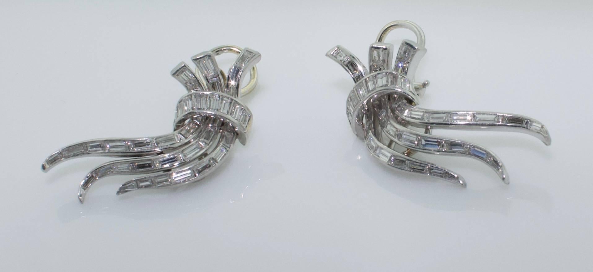 Diamond Earring in Platinum  Circa 1940's
Handmade with a Left and Right Earring.  Which is which is Up To You!
Currently Clip Back.  A Post Can Easily Be Added by Us or by a Qualified Jeweler
65 Baguettes  = 3.20 carets, Color GH Clarity