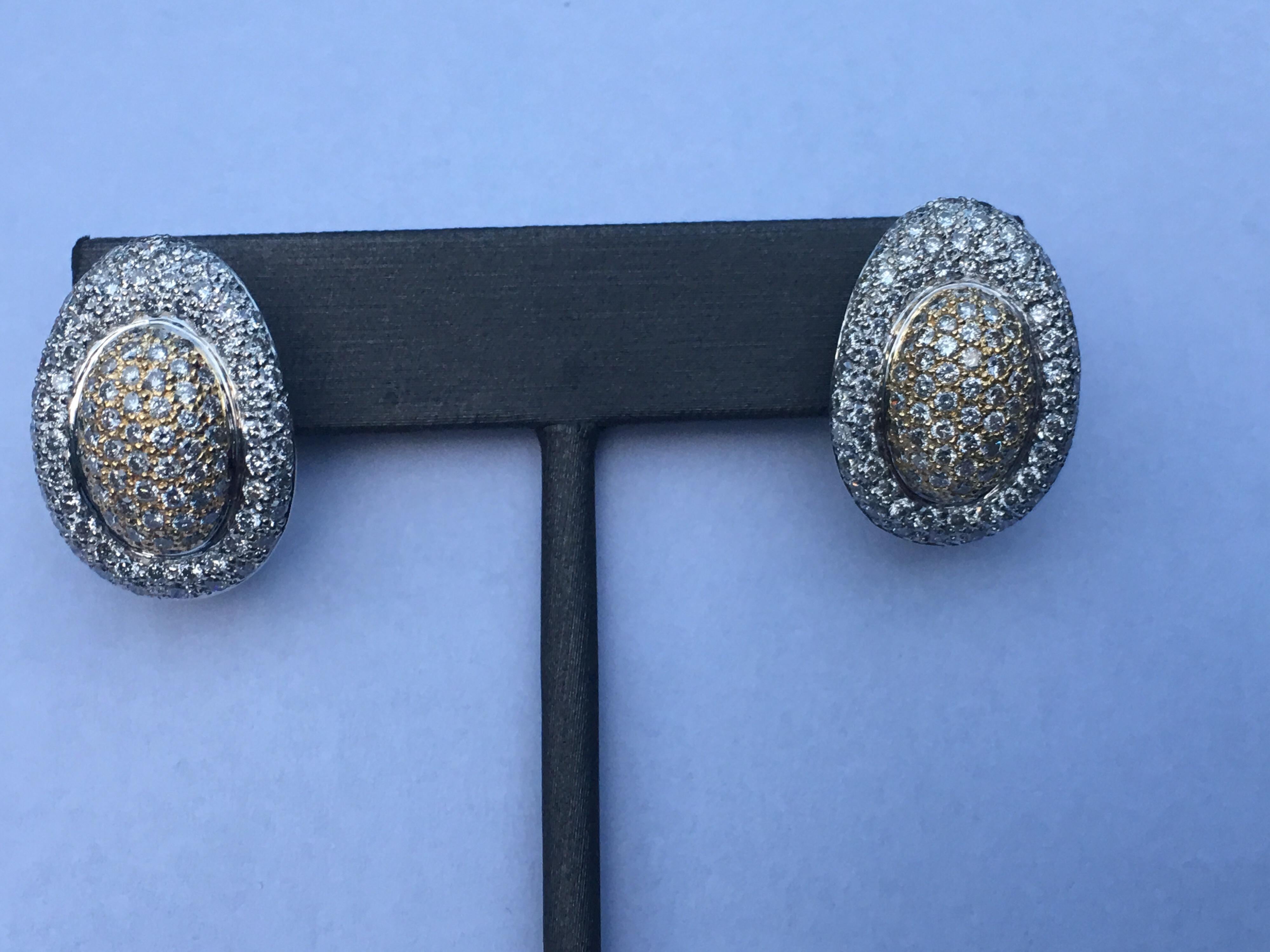 Diamond earring set in 18K Two Tone Gold. Total Diamond weight is 3.17 Carat. This is one of a kind earring and hand crafted.
