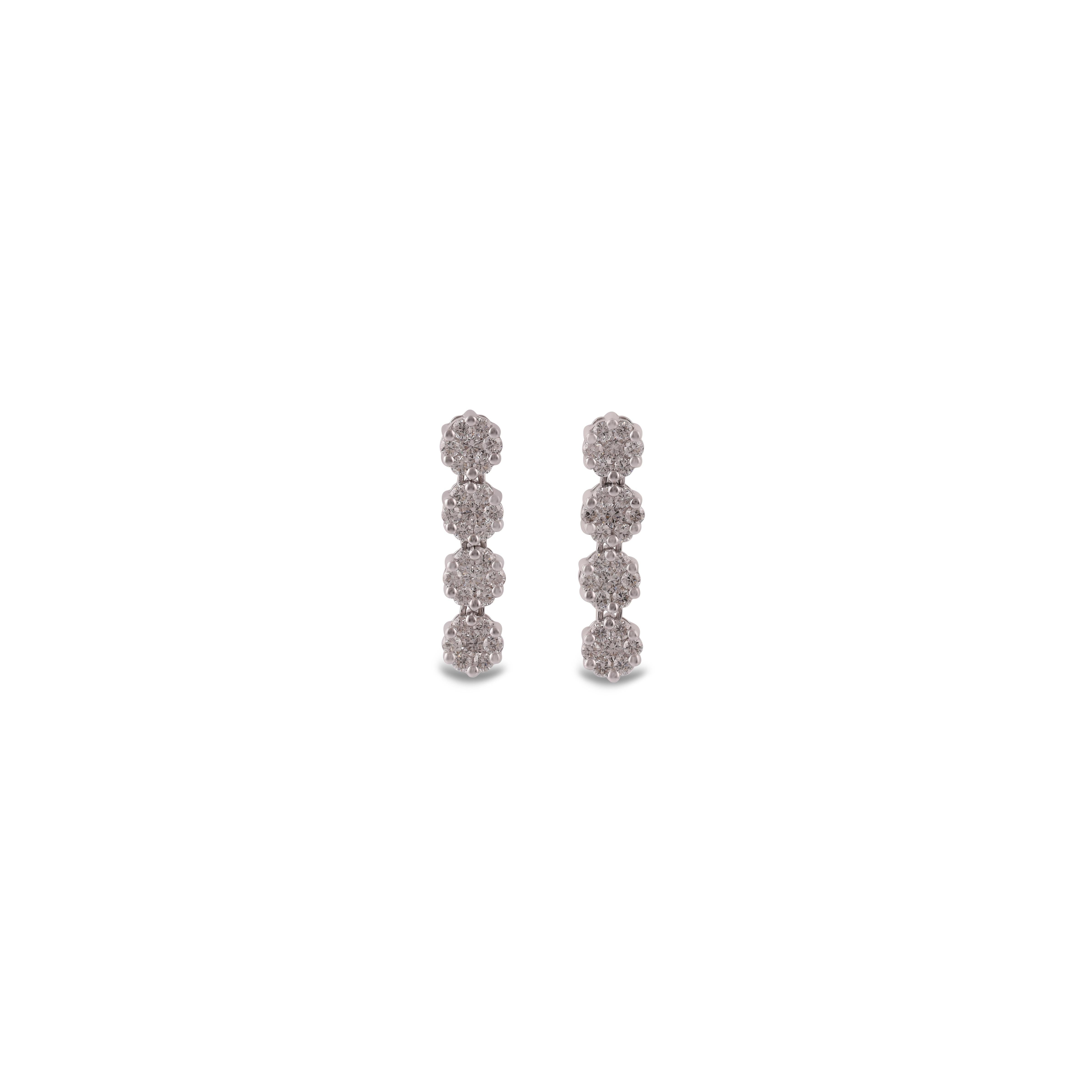 These are an exclusive earrings wit diamonds features  of  56 pieces of round  of diamonds weight 0.72 carats, These entire earrings are studded in 18k White gold, earrings have a simple pull & push mechanism. 