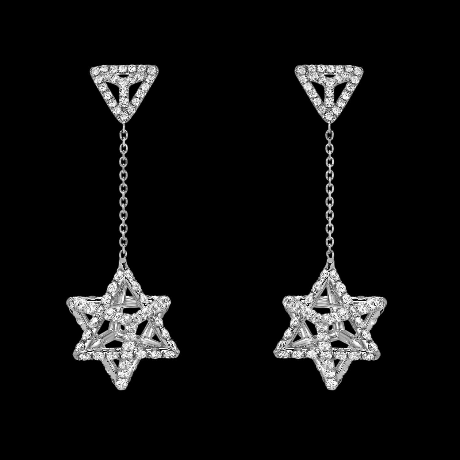 Heirloom quality 2.22 carat diamond platinum earrings, tethered by a three dimensional triangle stud, feature a single chain suspending a Merkaba star tetrahedron measuring 0.57”.  
Crafted by extremely skilled hands in the USA, Merkaba is a shining