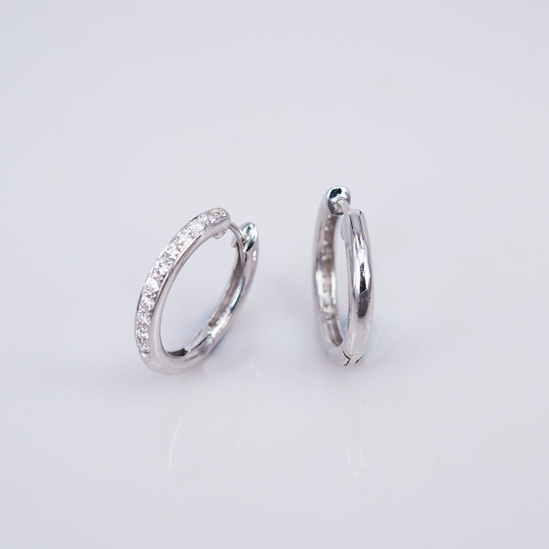 A lovely diamond earrings that you can use as everyday.The easy hoop that you can wear in every occasions. Or you can give as a lovely gift.Diamond use 0.36 ct H VS quality, the setting made in 18k White gold This piece is a special price so it is a