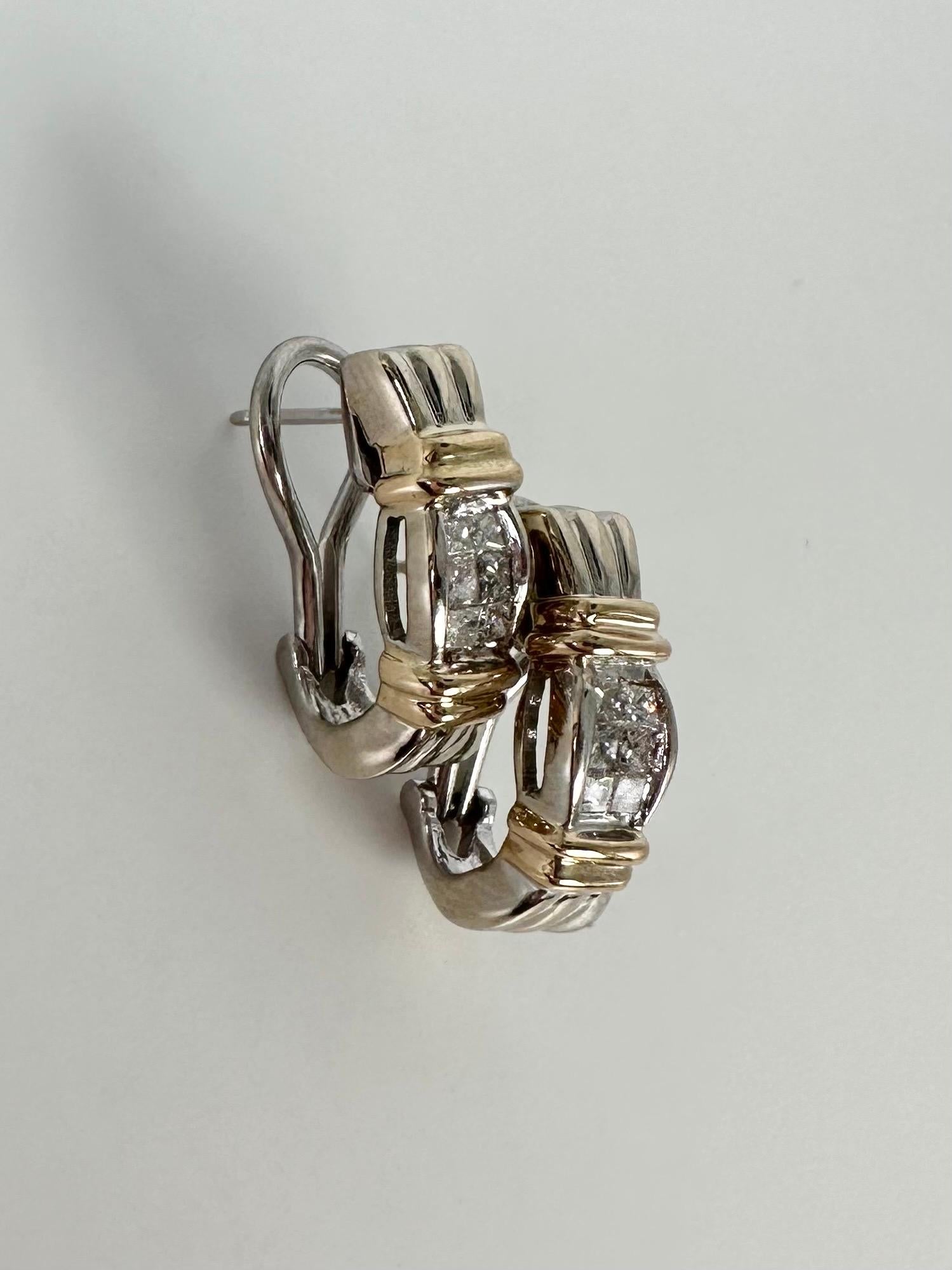 Stunning Omega backing earrings with diamonds set in invisible setting style and bow like design, made in 14KT two tone gold.

GOLD: 14KT gold
NATURAL DIAMOND(S)
Clarity/Color: SI/G
Carat:0.20ct
Grams:7.06
Item#: 150-000157 AOM

WHAT YOU GET AT