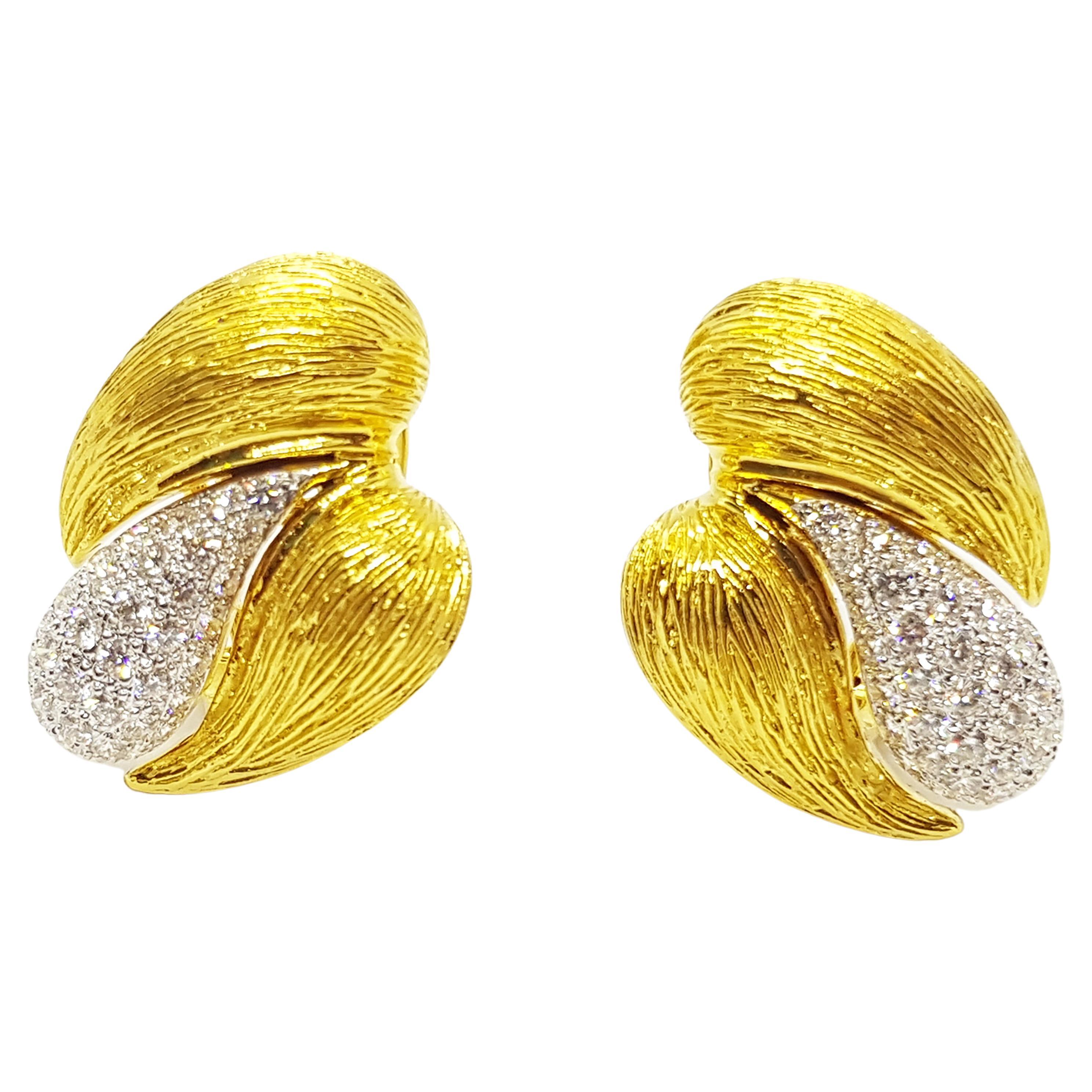 Boucles d'oreilles en or 18 carats serties de diamants