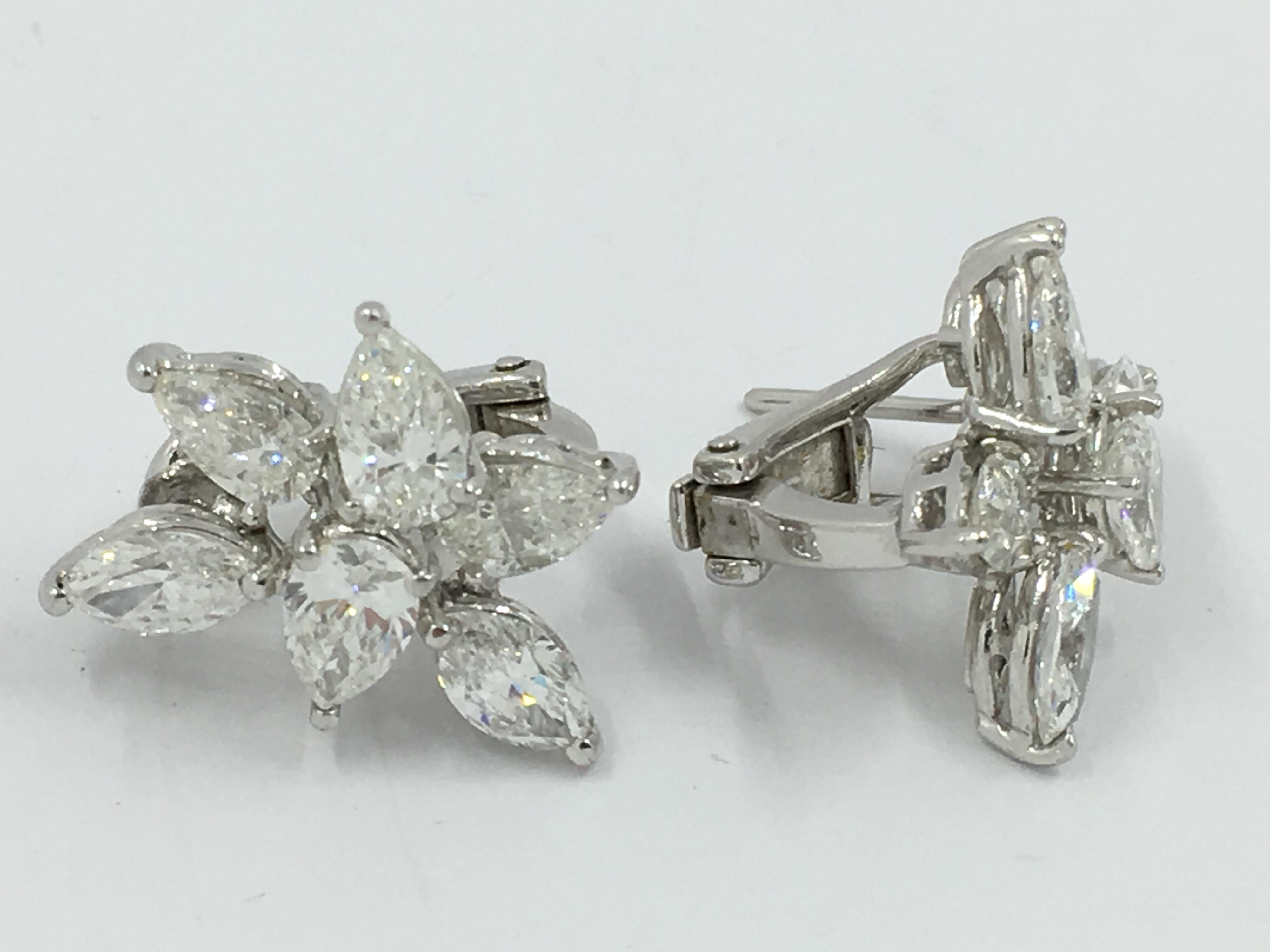 Pear Shape and Marquise Shape Diamond Earings set in 18 Kt White Gold 
Diamond weight 4.72 Ct
French Back
F VS1

