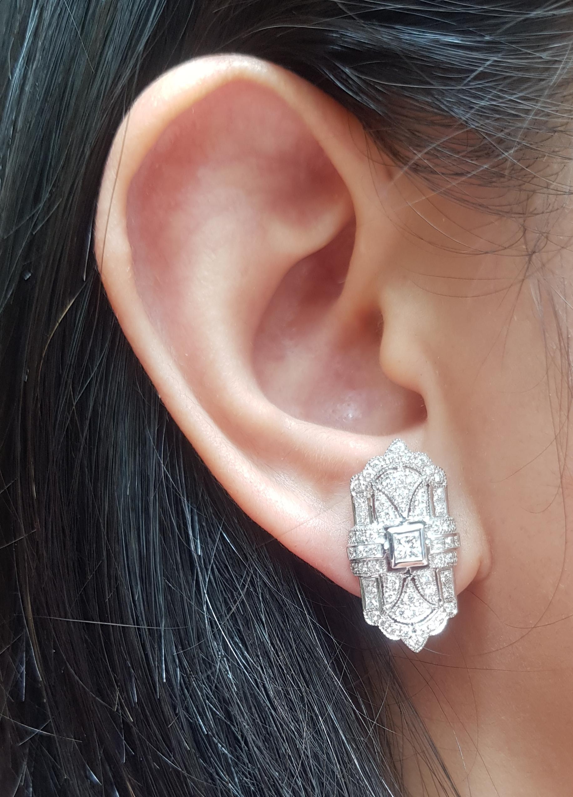 Diamond 1.6 carats Earrings set in 18 Karat White Gold Settings

Width:  1.3 cm 
Length: 2.3 cm
Total Weight: 8.68 grams


