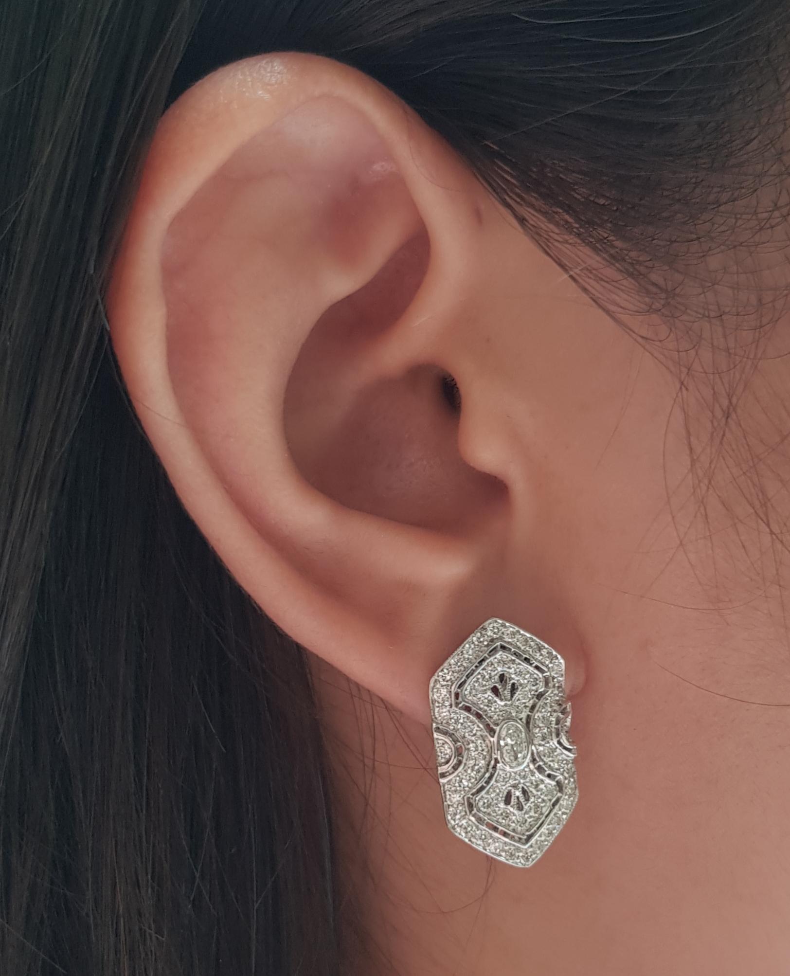 Diamond 1.66 carats Earrings set in 18 Karat White Gold Settings

Width: 1.3 cm 
Length: 2.3 cm
Total Weight: 10.92 grams

