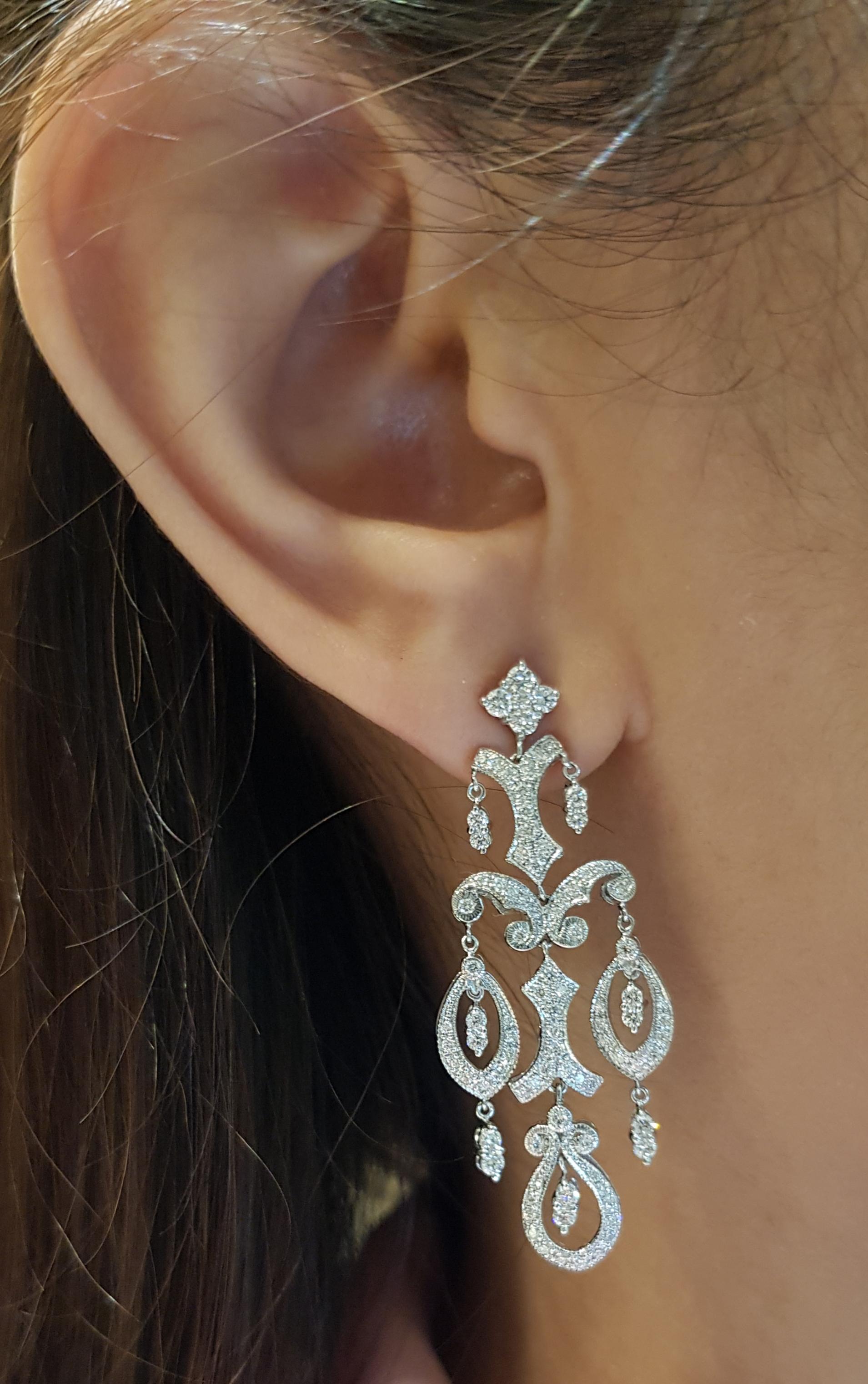 Diamond 1.51 carats Earrings set in 18 Karat White Gold Settings

Width:  2.0 cm 
Length:  4.6 cm
Total Weight: 11.5 grams

