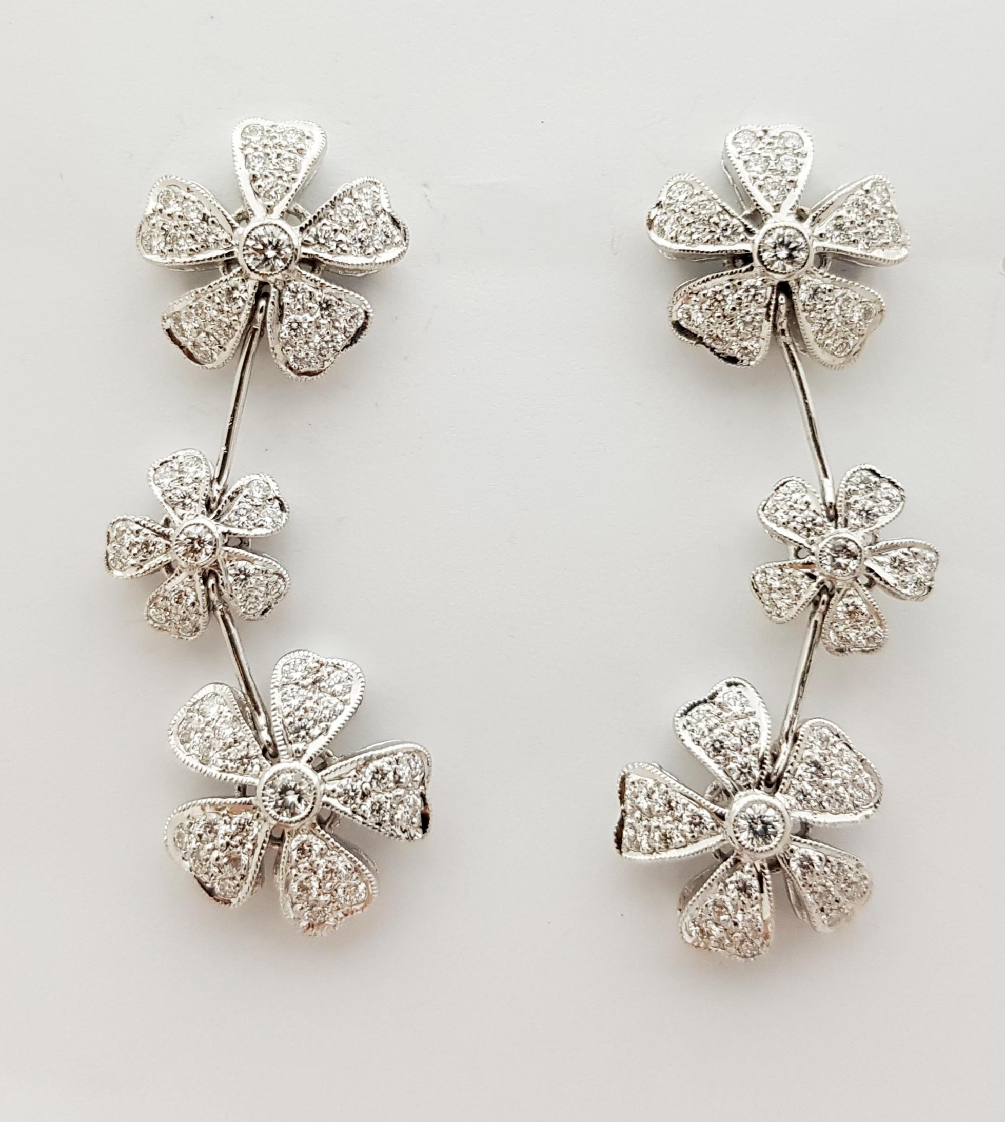 Contemporary Diamond  Earrings Set in 18 Karat White Gold Settings For Sale