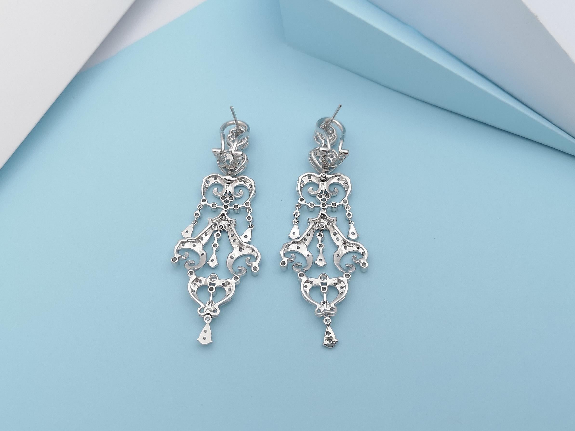 Brilliant Cut Diamond Earrings Set in 18 Karat White Gold Settings For Sale