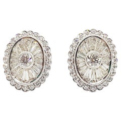 Boucles d'oreilles en or blanc 18 carats serties de diamants