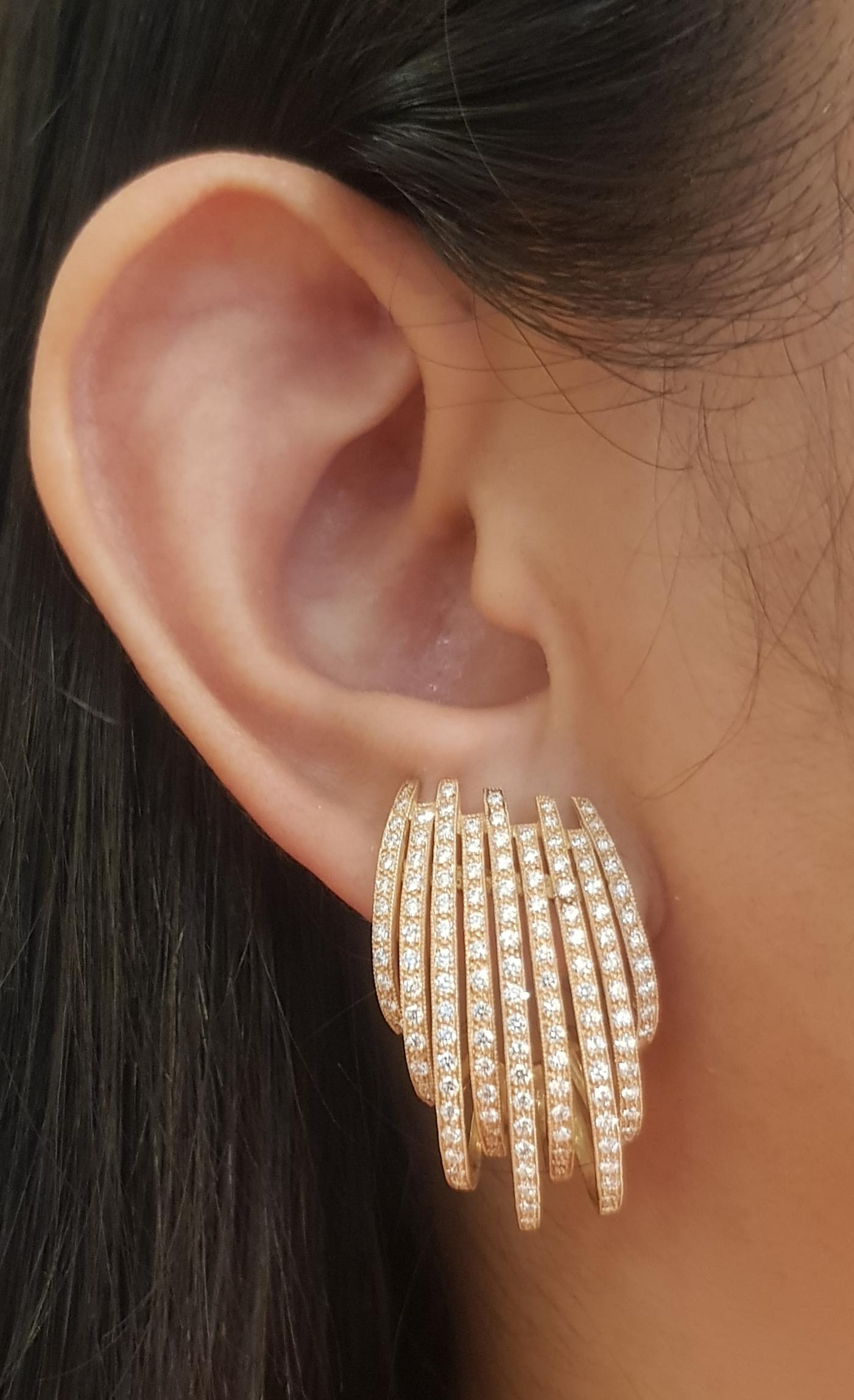 Diamond 2.20 carats Earrings set in 18K Rose Gold Settings

Width: 2.0 cm 
Length: 3.3 cm
Total Weight: 11.65 grams

