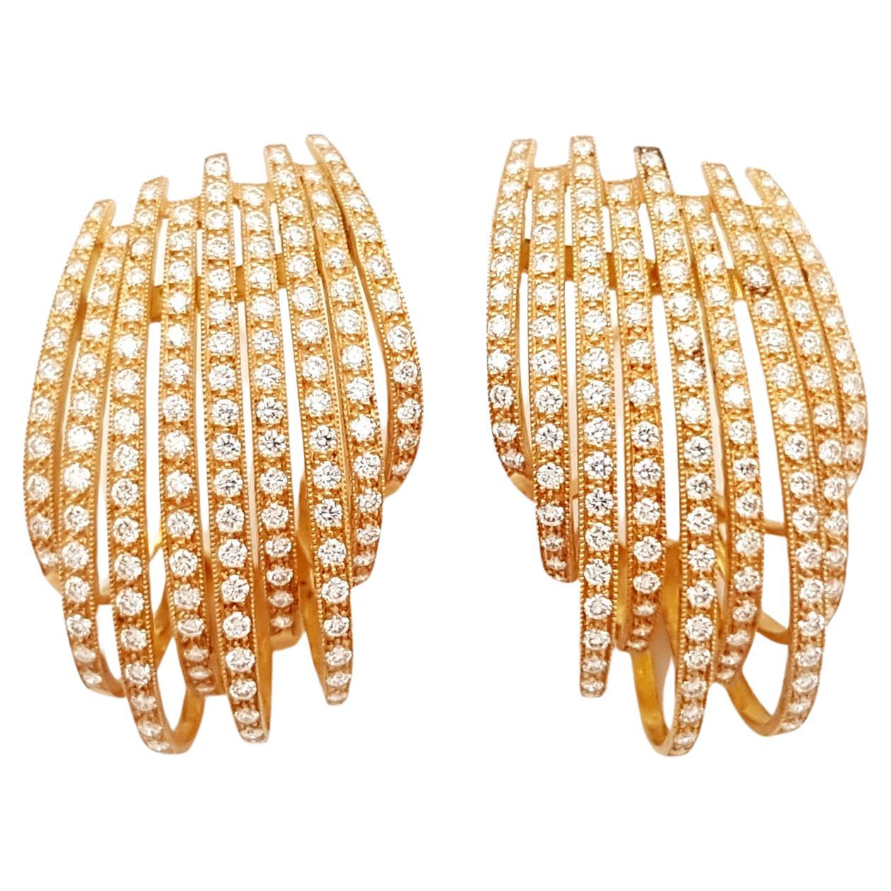 Diamond Earrings set in 18K Rose Gold Settings