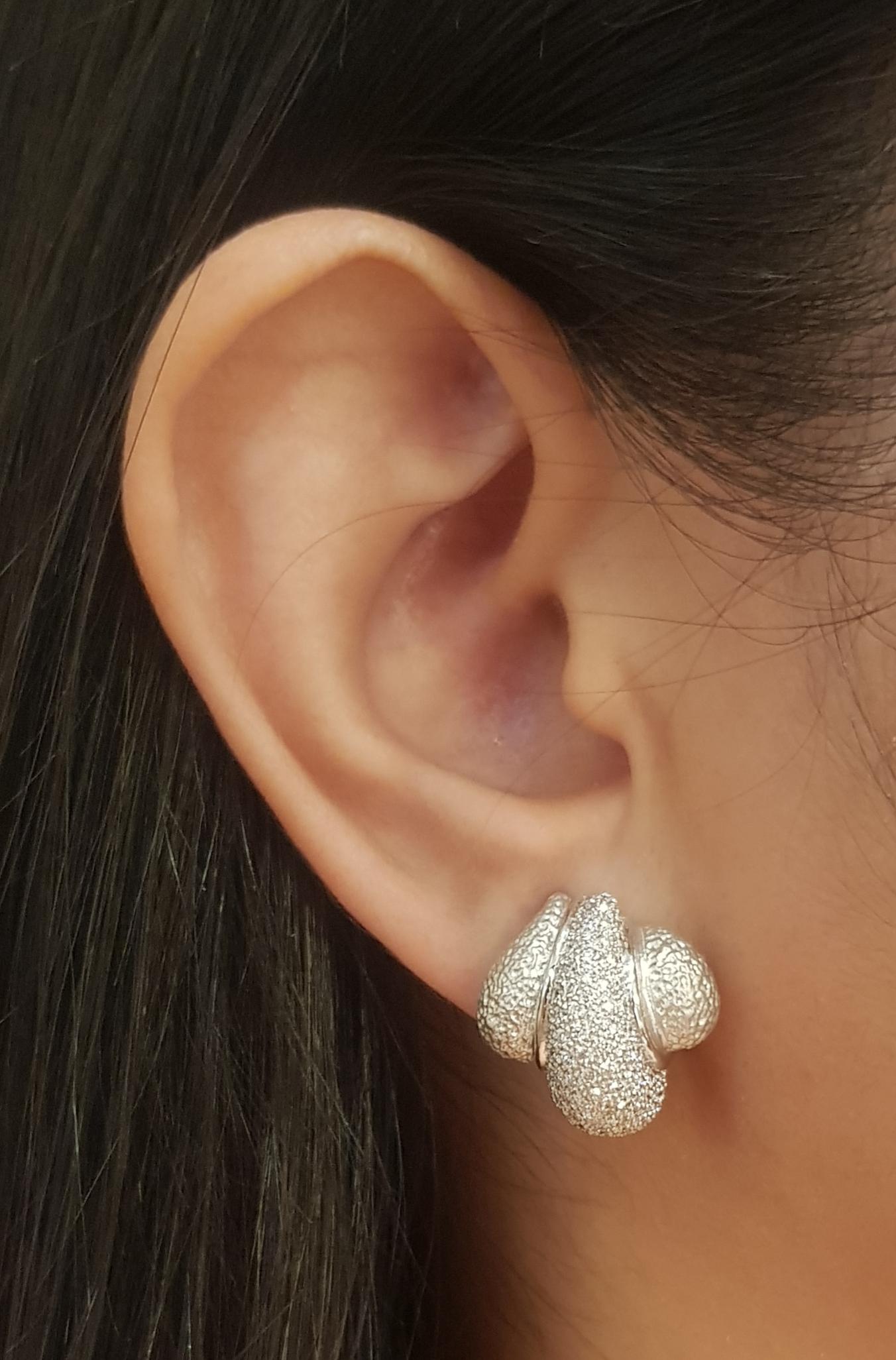 Diamond 1.94 carats Earrings set in 18K White Gold Settings

Width: 1.8 cm 
Length: 1.8 cm
Total Weight: 17.17 grams


