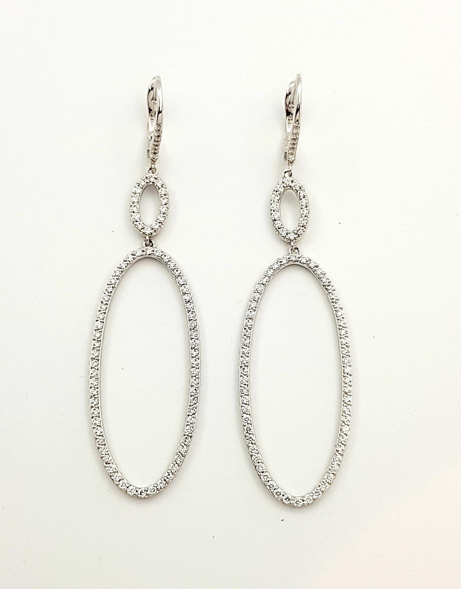 Contemporary Diamond Earrings set in 18K White Gold Settings For Sale