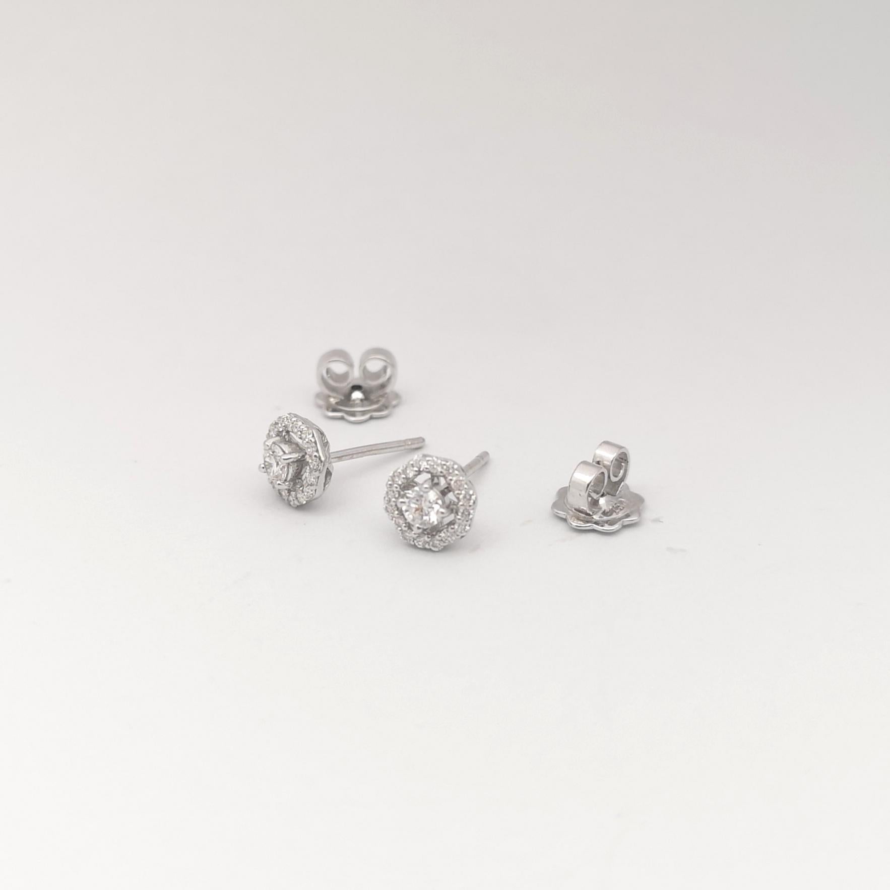 Women's Diamond Earrings set in 18K White Gold Settings For Sale