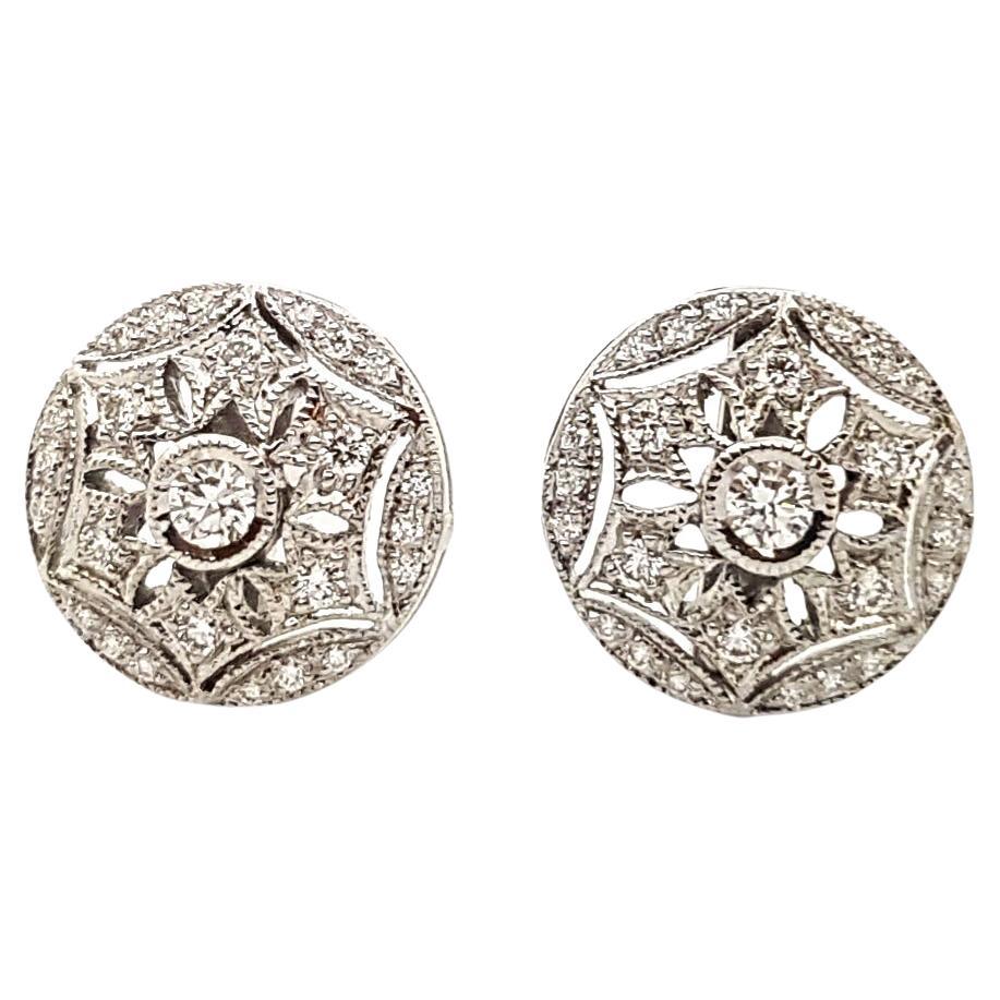 Diamond Earrings set in 18K White Gold Settings