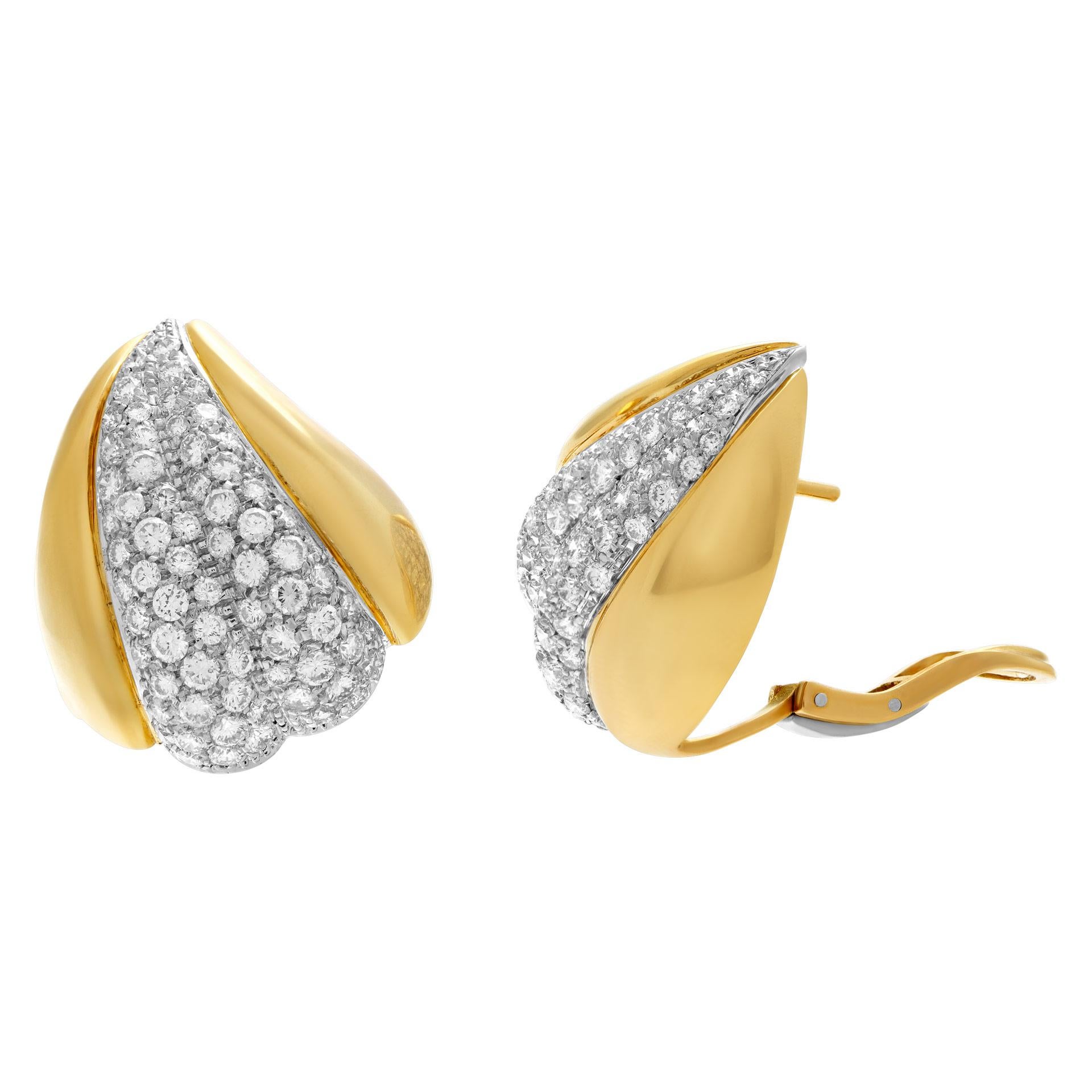Striking leaf earrings set in 18k yellow gold with full cut round brilliant diamonds totaling over 2.15 carats. Diamonds estimate F-G color, VVS-VS clarity. Omega post backs.30 mm x 25mm (widest part).
