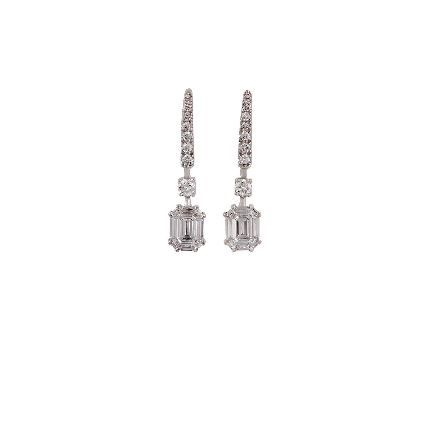 A fantastic pair of dangle earrings features baguette and brilliant-cut round shaped diamonds set in an illusion setting to make it look like a larger emerald cut diamond, in these earrings the combined weight of diamonds is 1.98 carat, earrings are