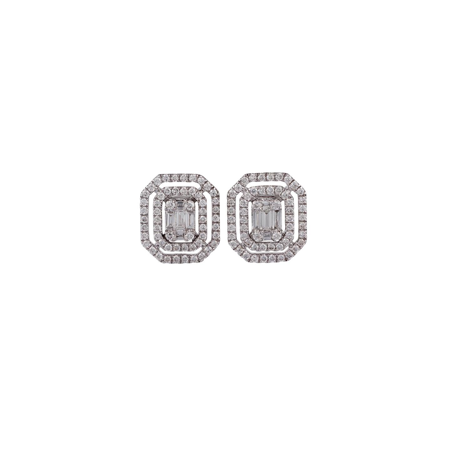 A fantastic pair of earrings features baguette and brilliant-cut round shaped diamonds set in an illusion setting to make it look like a larger emerald cut diamond, in these earrings the combined weight of diamonds is 0.85 carat, they are studded in