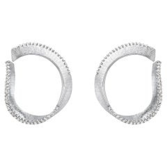 TWIST HOOP EARRINGS   White gold with a white diamond edge by Liv Luttrell