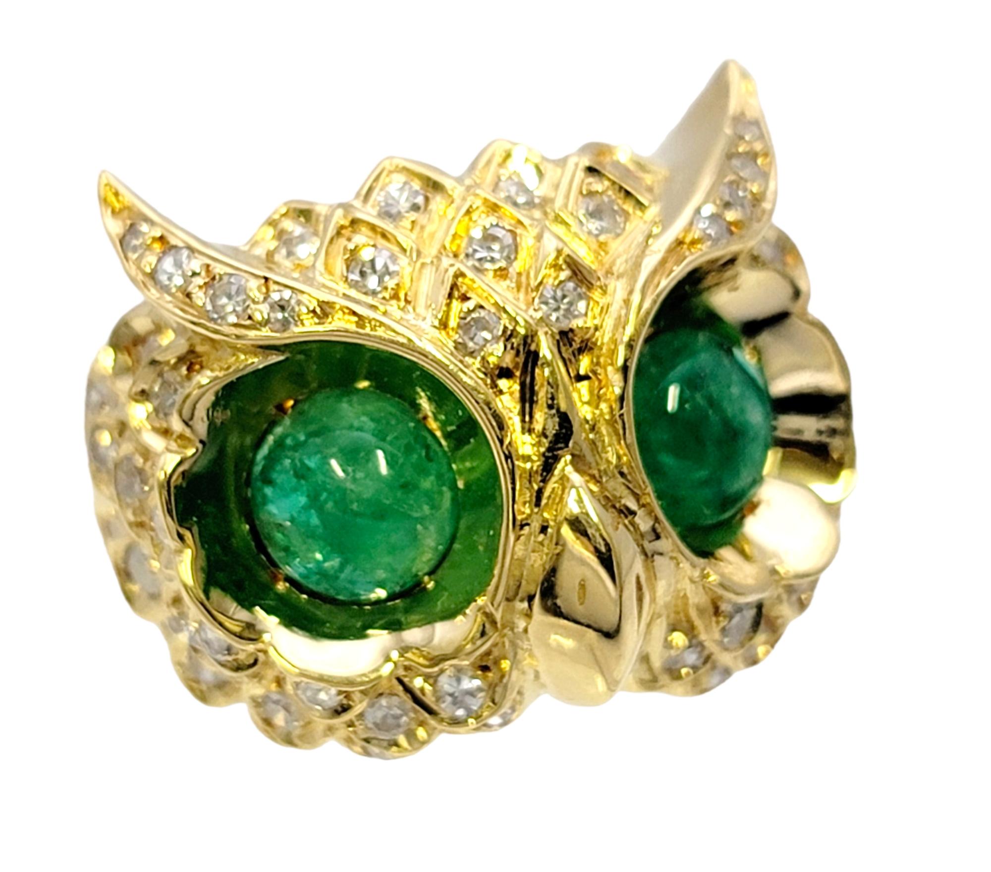 Ring size: 4.5

Calling all bird lovers! Featured here is a wonderfully detailed diamond and emerald owl band ring. This charming piece is filled with character from every angle with its gorgeous gemstones and intricate detail work. A fabulous