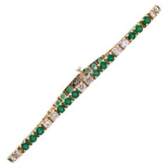 Diamond Emerald 14 Karat Yellow Gold Line Tennis Bracelet Round Brilliant