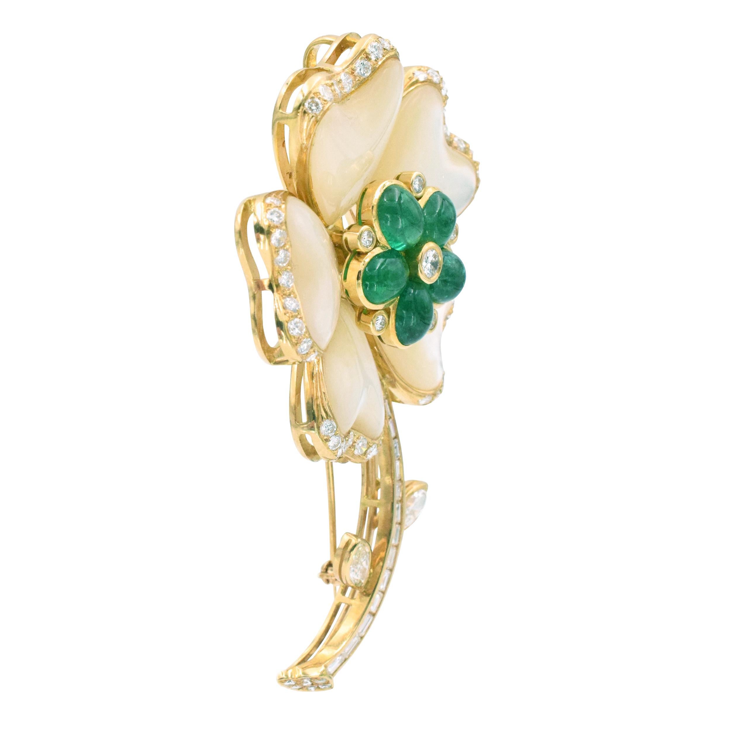 Diamond, emerald and mother of pearl flower pendant and brooch in 18k yellow gold. The flower is set with 5 oval cut cabochon emeralds weighing total of approximately 5.00ct, 58 round brilliant cut diamonds set in the center, around the edges and on