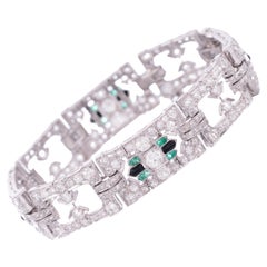 Diamond, Emerald, and Onyx Art Deco Platinum Bracelet Circa 1930