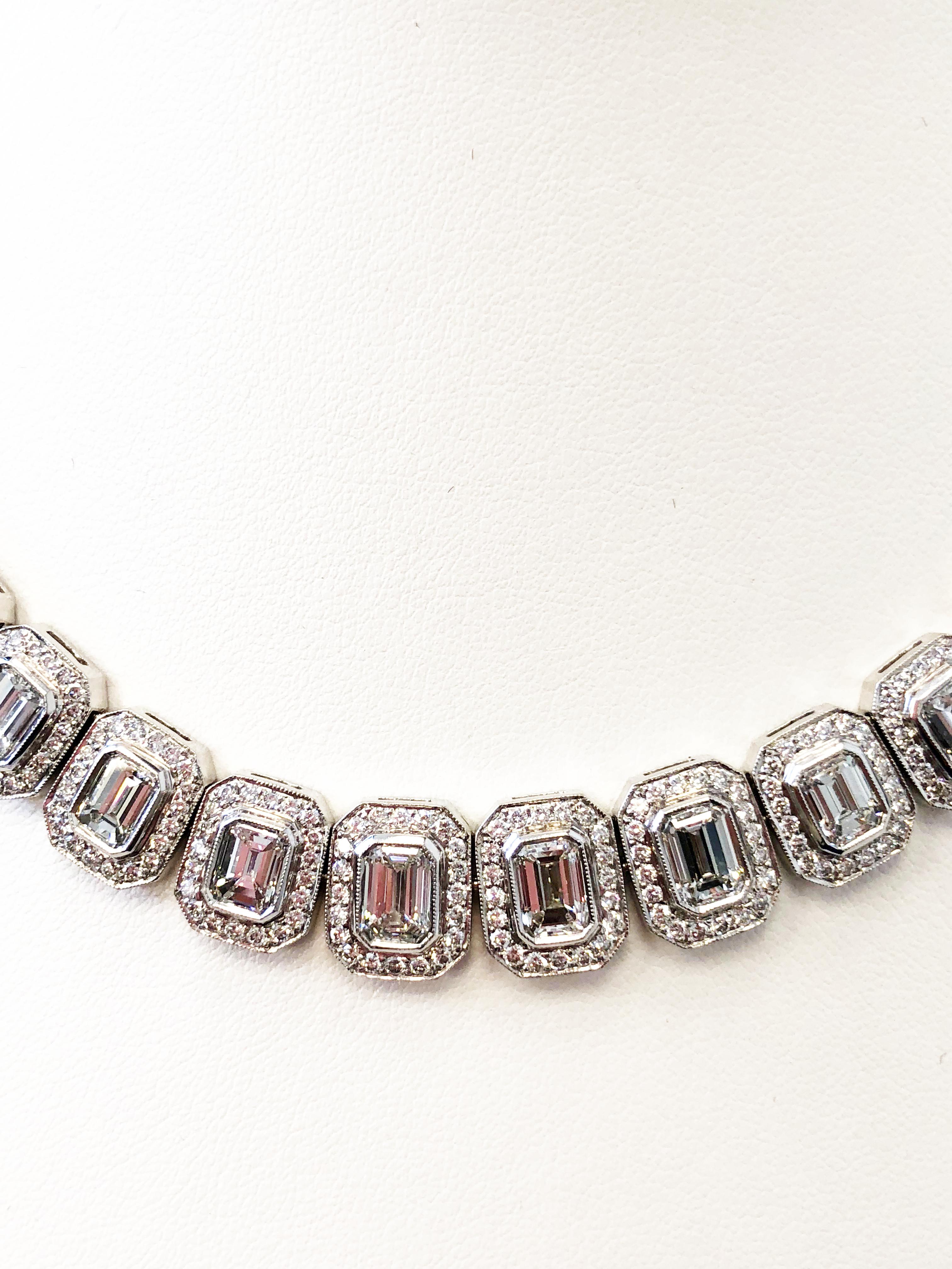 This necklace is stunning! 35 carats of beautiful white and bright emerald cut diamonds VVS clarity with 12 carats of white and bright diamond rounds.  Handcrafted platinum mounting with secure closure that is made very well.  Necklace is dainty and