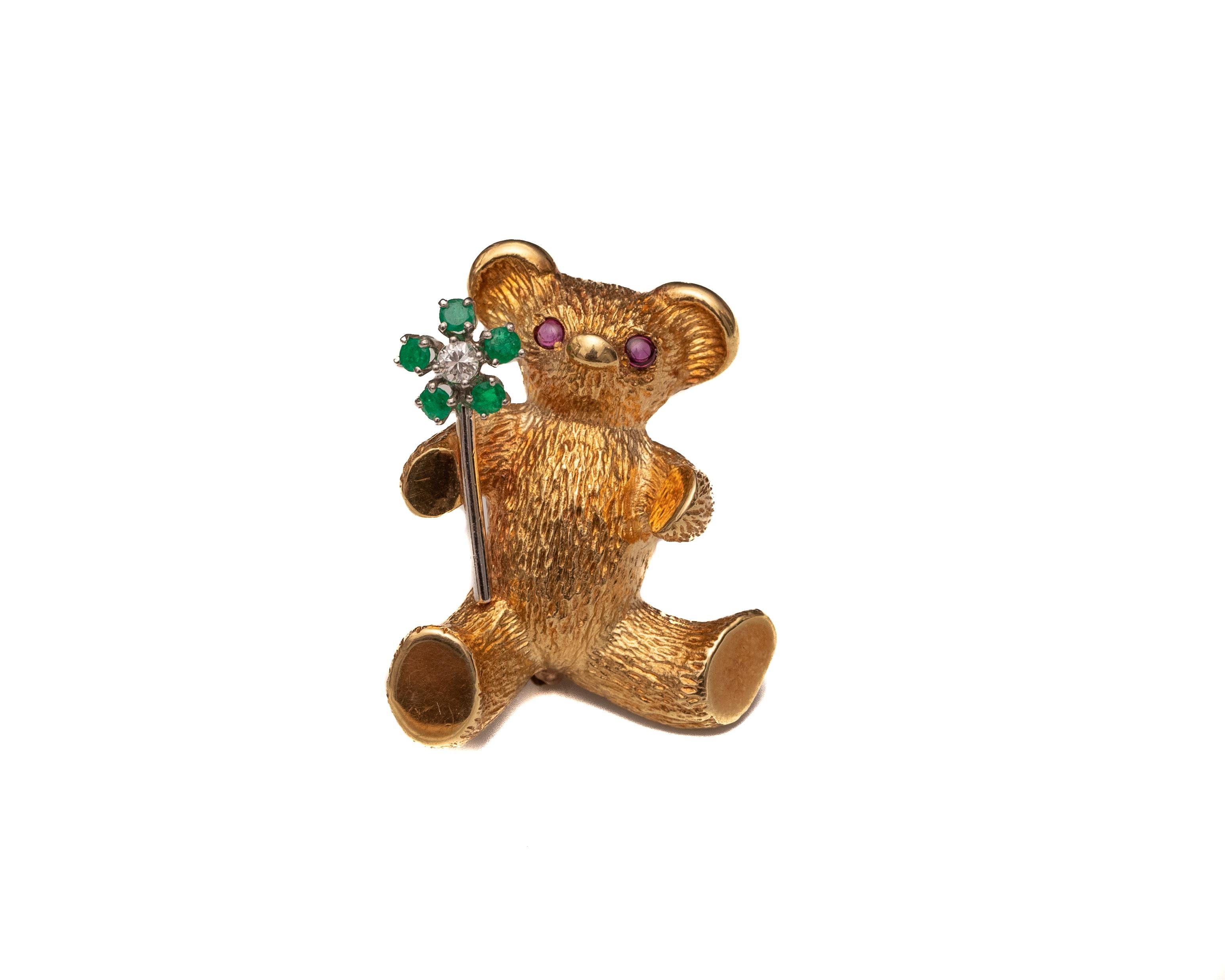 Brooch Pin Details:
Metal type: 18 Karat Yellow Gold with White Gold Accent
Weight: 15 Grams
Measures: 1.5 Inches length x 1 Inch width

The teddy bear is made up of  high contrast 18 karat yellow gold that is textured on the entire body. Eyes are