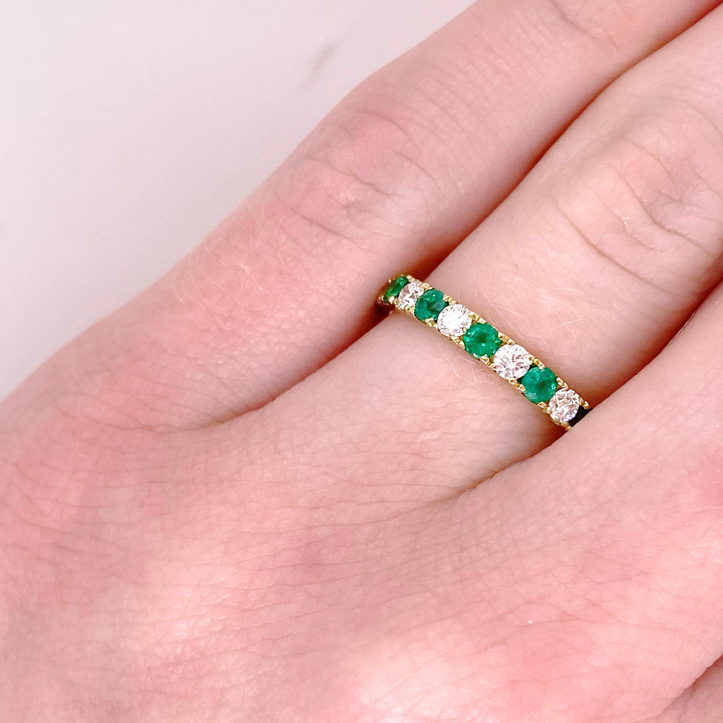 The green emerald and white diamond ring is a lovely band for a wedding band, anniversary band or a stackable band. The 14 karat yellow gold band is really excellent quality and is something that will be cherished forever. The details for this