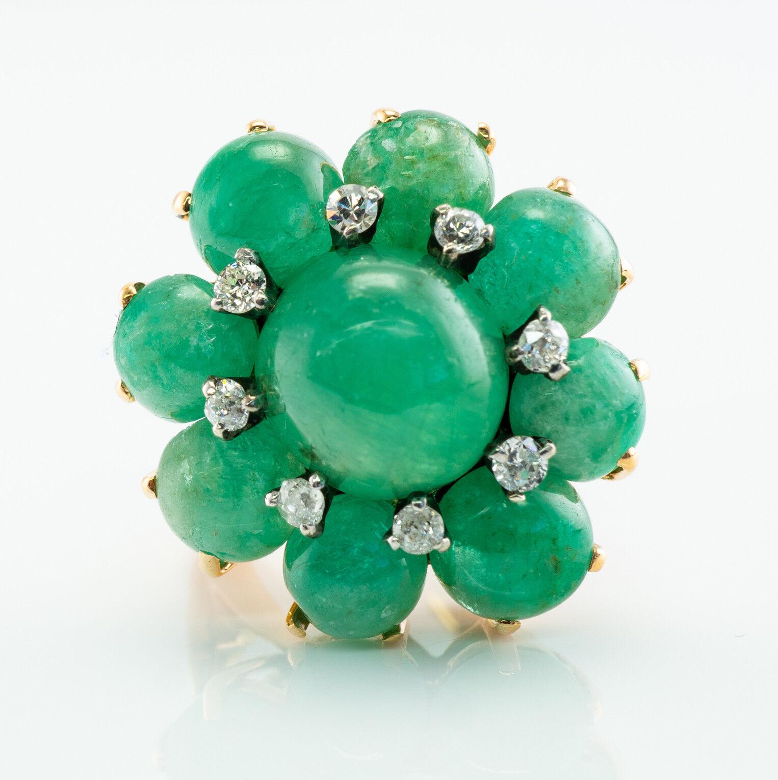 This gorgeous vintage ring is finely crafted in solid 14K Yellow Gold (carefully tested and guaranteed). The center Emerald cabochon is 10mm (3.74 carats), eight more emeralds total 6.40 carat. Eight Old mine cut Diamonds are estimated to be VS2 to