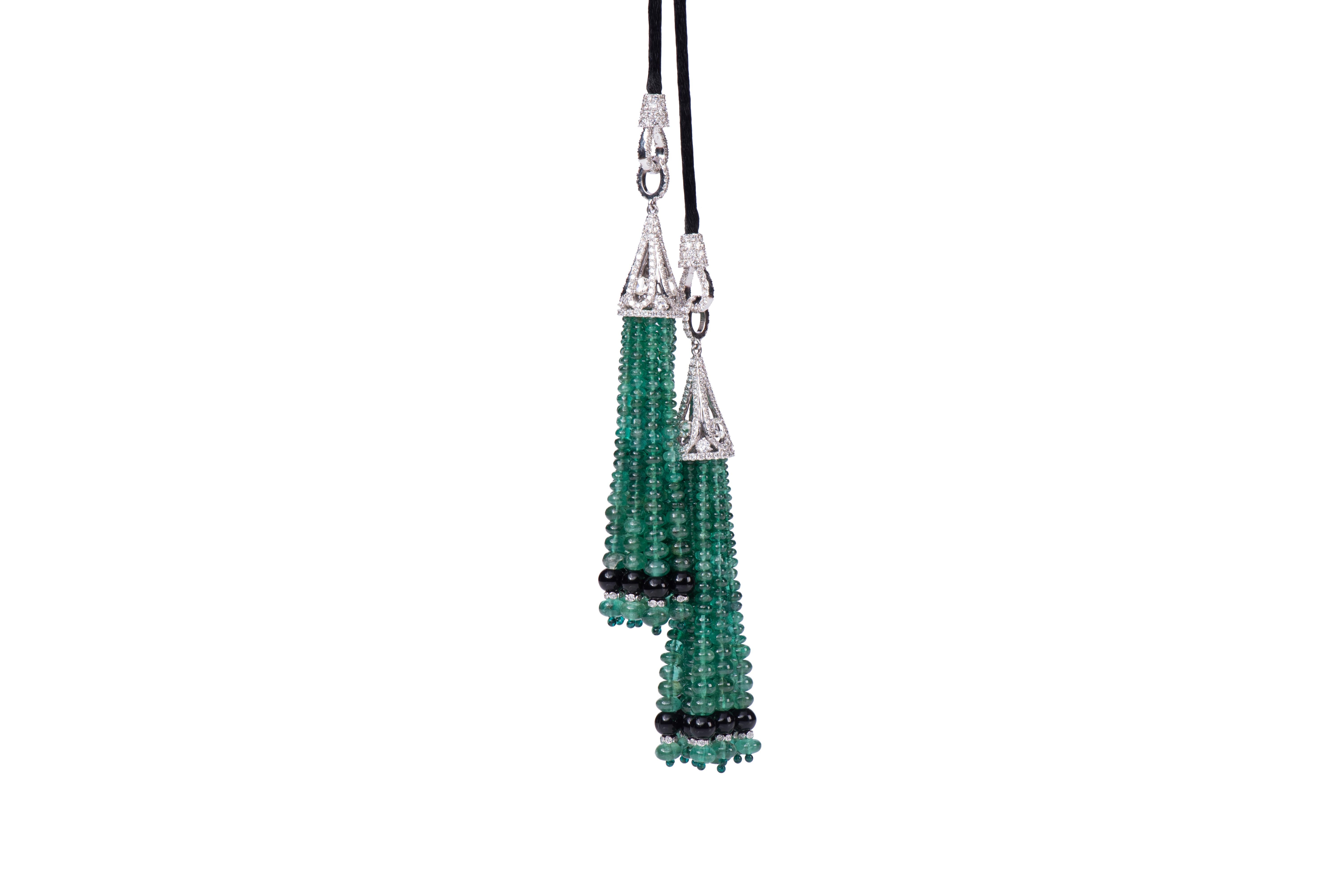 Art Deco, 18K White Gold, Onyx, Round Diamonds and Emerald beads (134.8ct) Double Tassel with diamond roundels & Long Black Chord Necklace.  