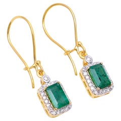 Orecchino con diamante e smeraldo in oro 14k con 0,25 carati di daimond e 1,59 carati di smeraldo