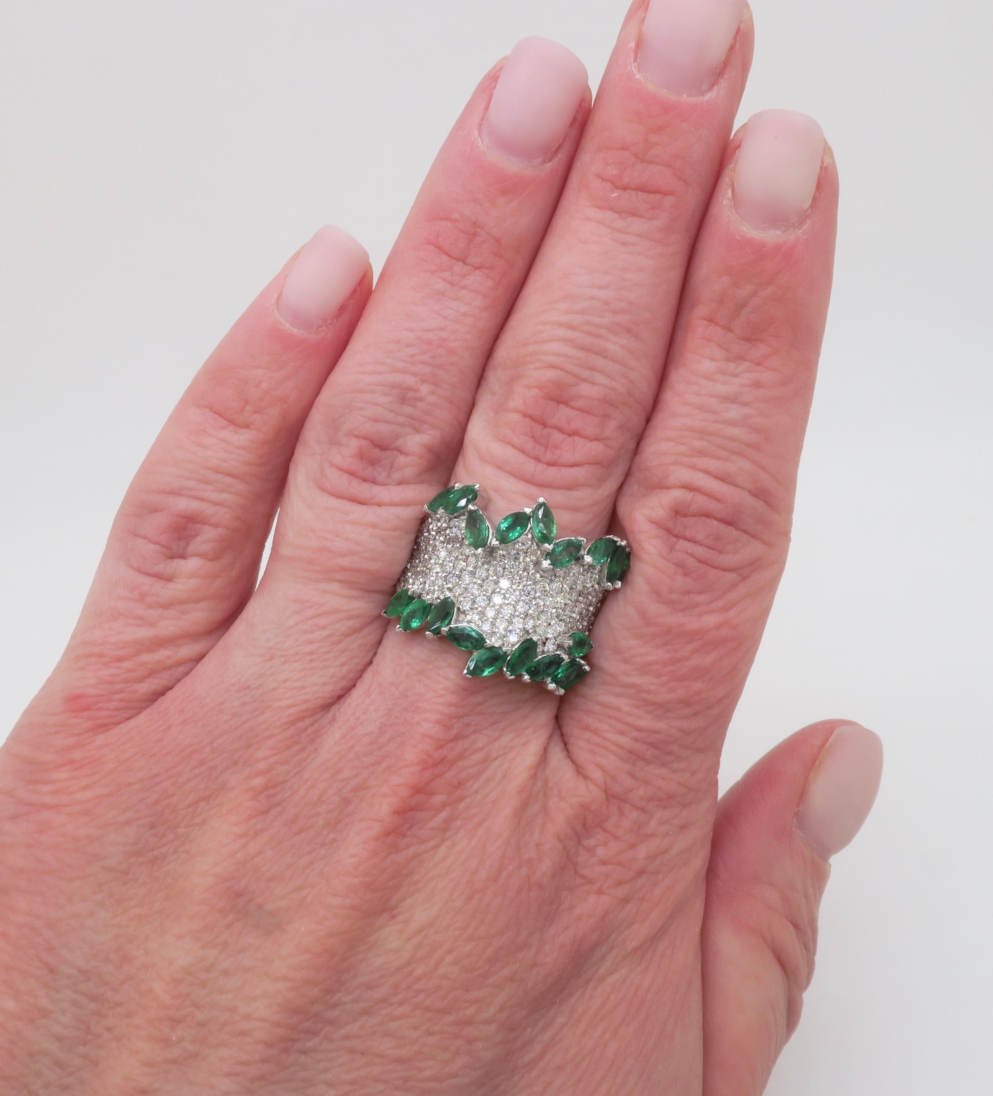 Stunning EFFY Diamond & Emerald band ring. 

Diamond Carat Weight: 1.50CTW
Diamond Cut: Round Brilliant cut 
Color: F-H
Clarity: VS-SI
Ruby Carat Weight: 2.40CTW
Gemstone Cut: Marquise cut 
Metal: 14k White Gold 
Stamped: 