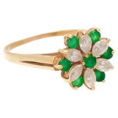 Anello con diamante e fiore di smeraldo