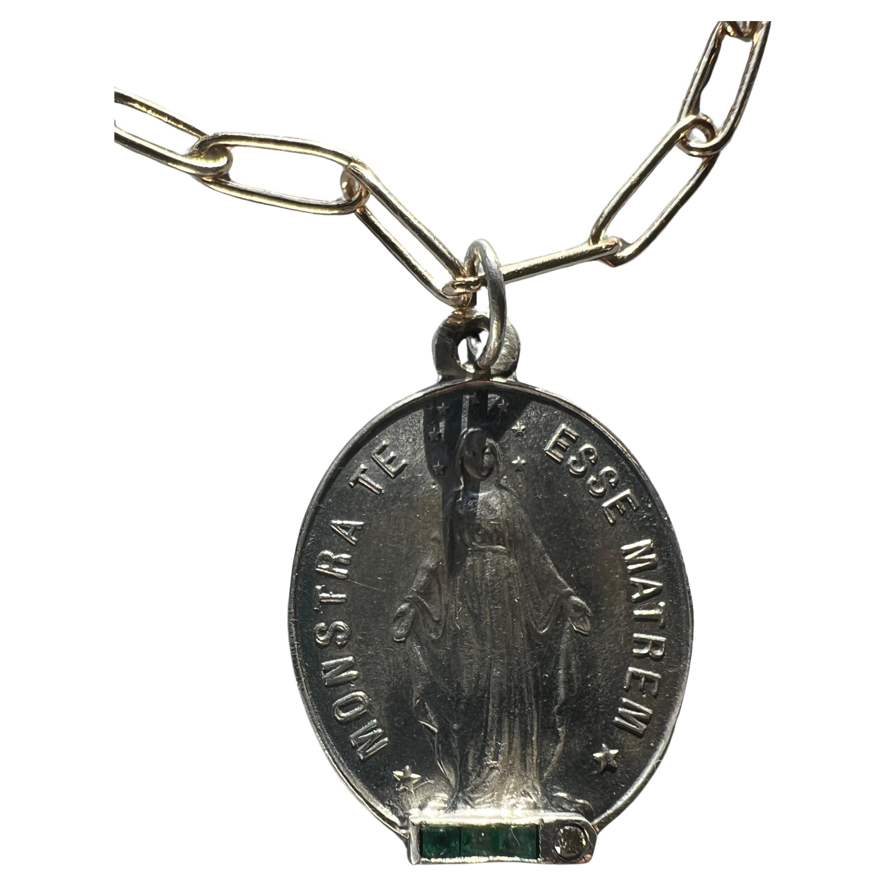 Diamond Emerald Miraculous Medal Virgin Mary Silver Necklace

Diamond Emerald Medal Virgin Mary Silver Necklace

Symbols or medals can become a powerful tool in our arsenal for the spiritual. 
Since ancient times spiritual pendants, religious medals
