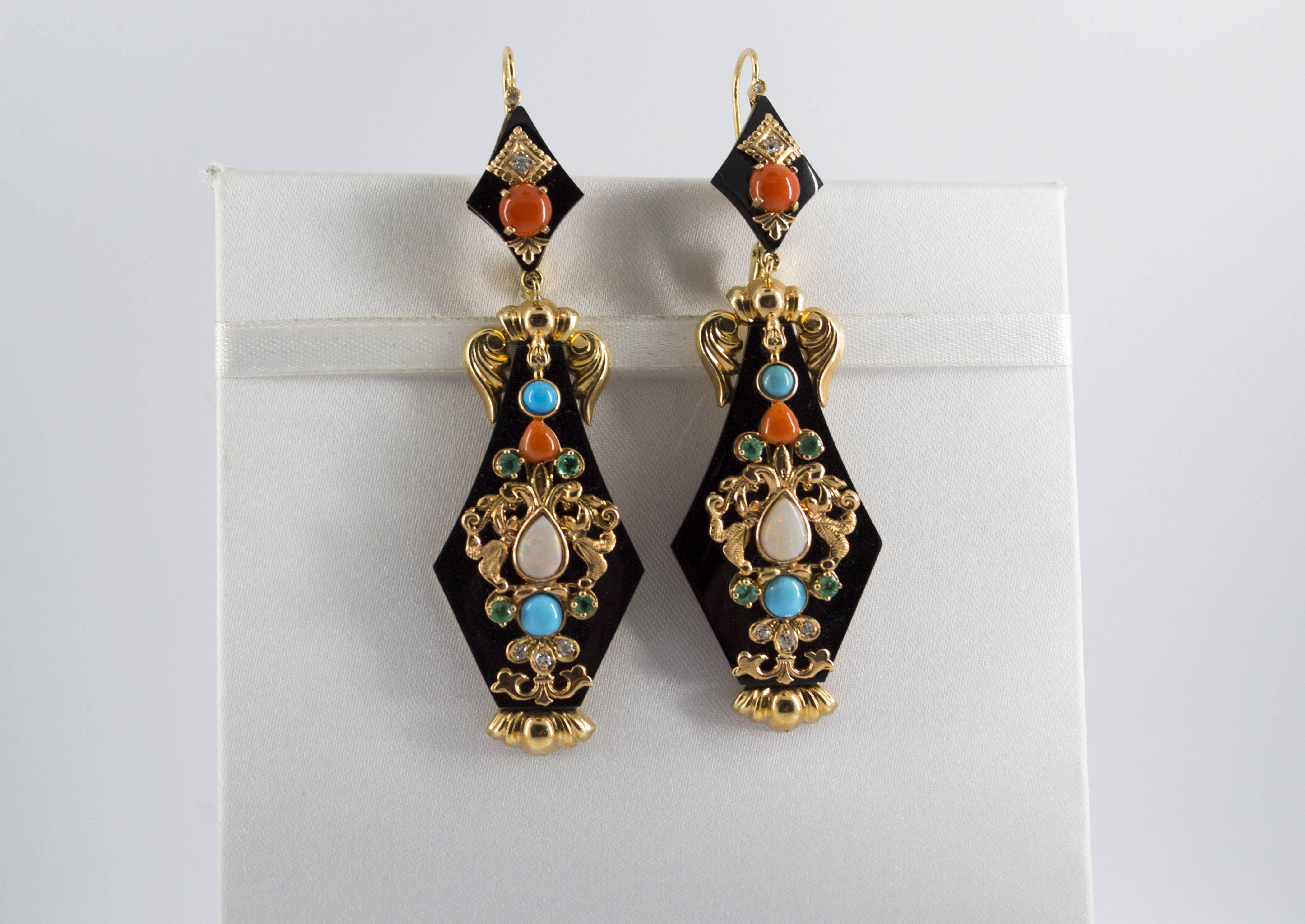 These Earrings are made of 14K Yellow Gold.
These Earrings have 0.40 Carats of White Diamonds.
These Earrings have 0.20 Carats of Emeralds.
These Earrings have also Onyx, Turquoise, Red Coral, Opal.
All our Earrings have pins for pierced ears but we