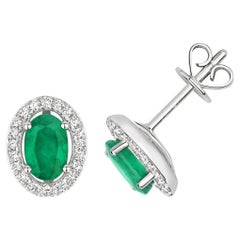 DIAMOND & EMERALD OVAL HALO STUDS IN 9CT WHITE Gold