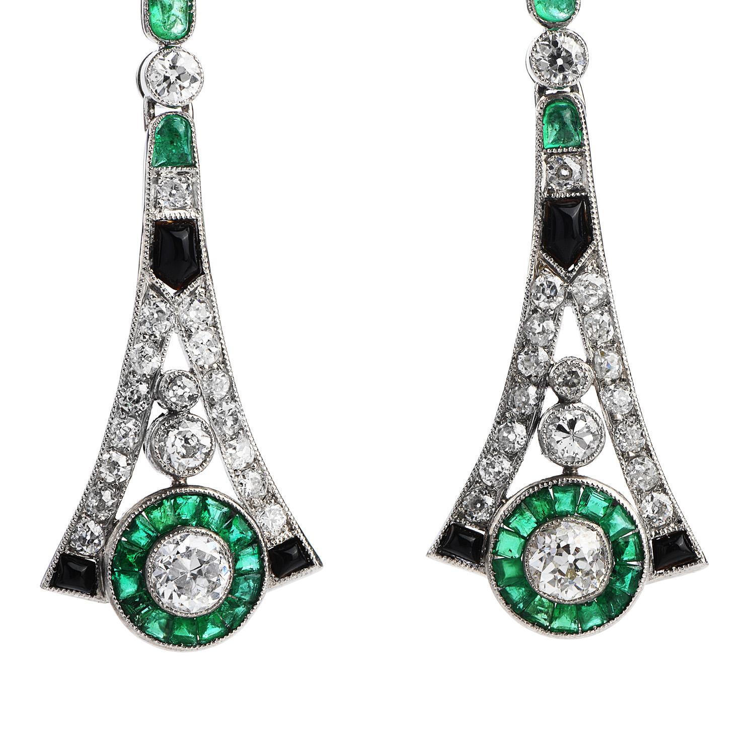 Feel spacial with these absolutely gorgeous Estate Diamond Emerald Platinum Drop Dangle Earrings.

These earrings are crafted in luxurious platinum with post backings for pierced ears. 

There are bright genuine emeralds, Cushion shape and baguette