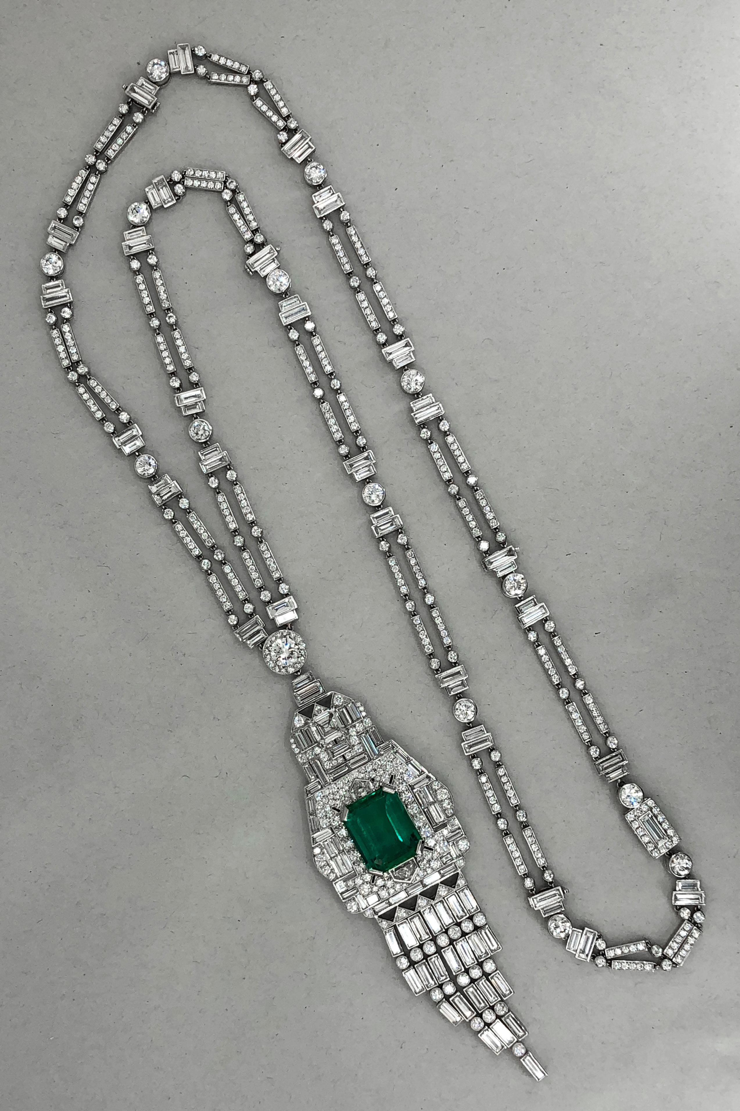 Important Rare Art Deco Diamond Certified Emerald Platinum Necklace
The Colombian Emerald weighing approx. 17.08 with GUBELIN cert.
Reference No: N2040
Significance
The 1925 Paris Exposition Internationale des Arts Décoratifs et Industriels Modernes