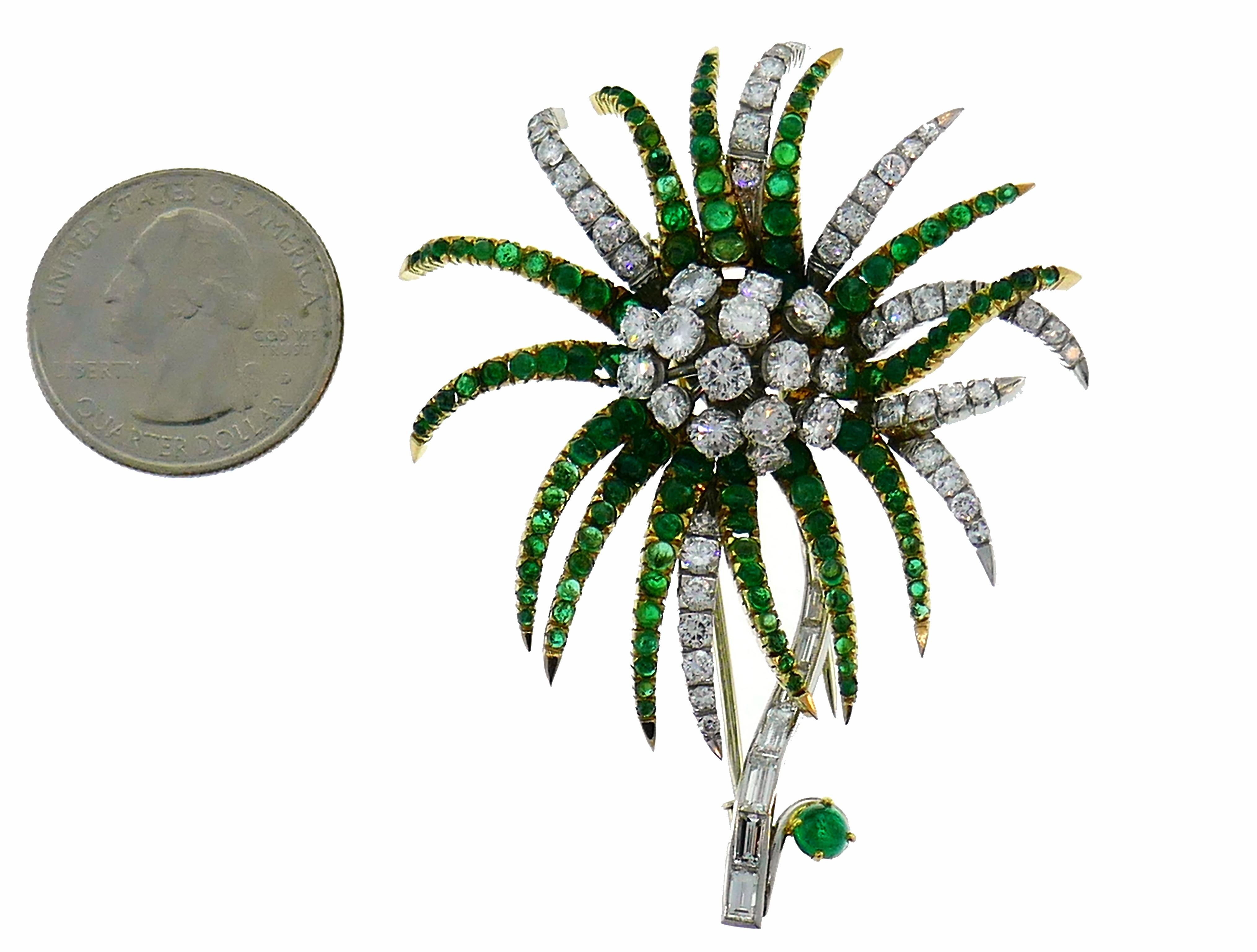 Lovely Chrizantema brooch created in France in the 1960s.
Made of 18 karat white gold and platinum, The clip is set with approximately 5 carats of round brilliant and baguette cut diamonds and 2.80 carats of round cabochon emeralds.
Weight 31.3