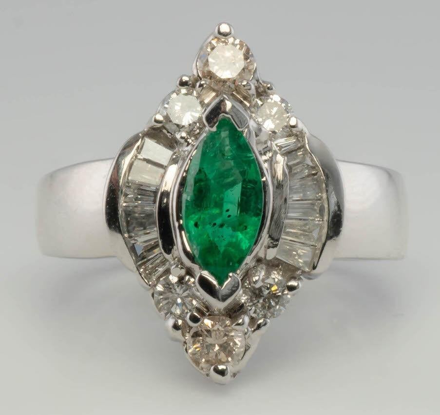 marquise cut emerald ring white gold