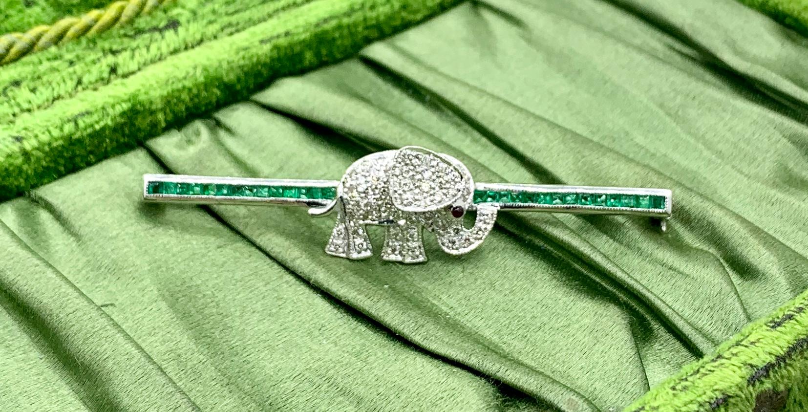 Women's Diamond Emerald Ruby Elephant Brooch Pin 18 Karat White Gold For Sale