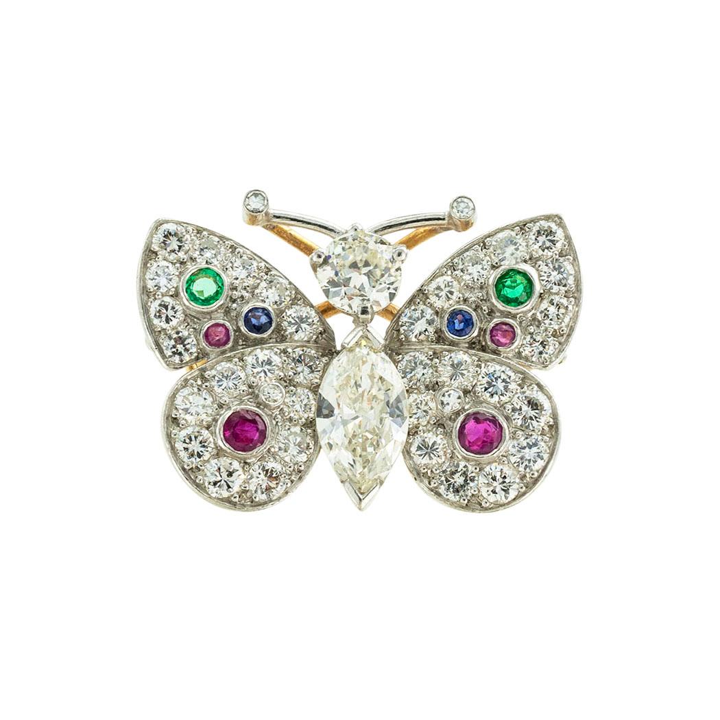 Diamond Emerald Ruby Sapphire platinum and gold butterfly ring circa 1960. *
Jacob's Diamond & Estate Jewelry

ABOUT THIS ITEM:  #R-DJ615A. Scroll down for detailed specifications.  This vintage emerald, ruby, sapphire, and diamond butterfly ring