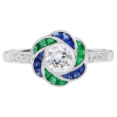 Anillo de diamantes y zafiro esmeralda talla fantasía halo flor de rosa estilo art déco