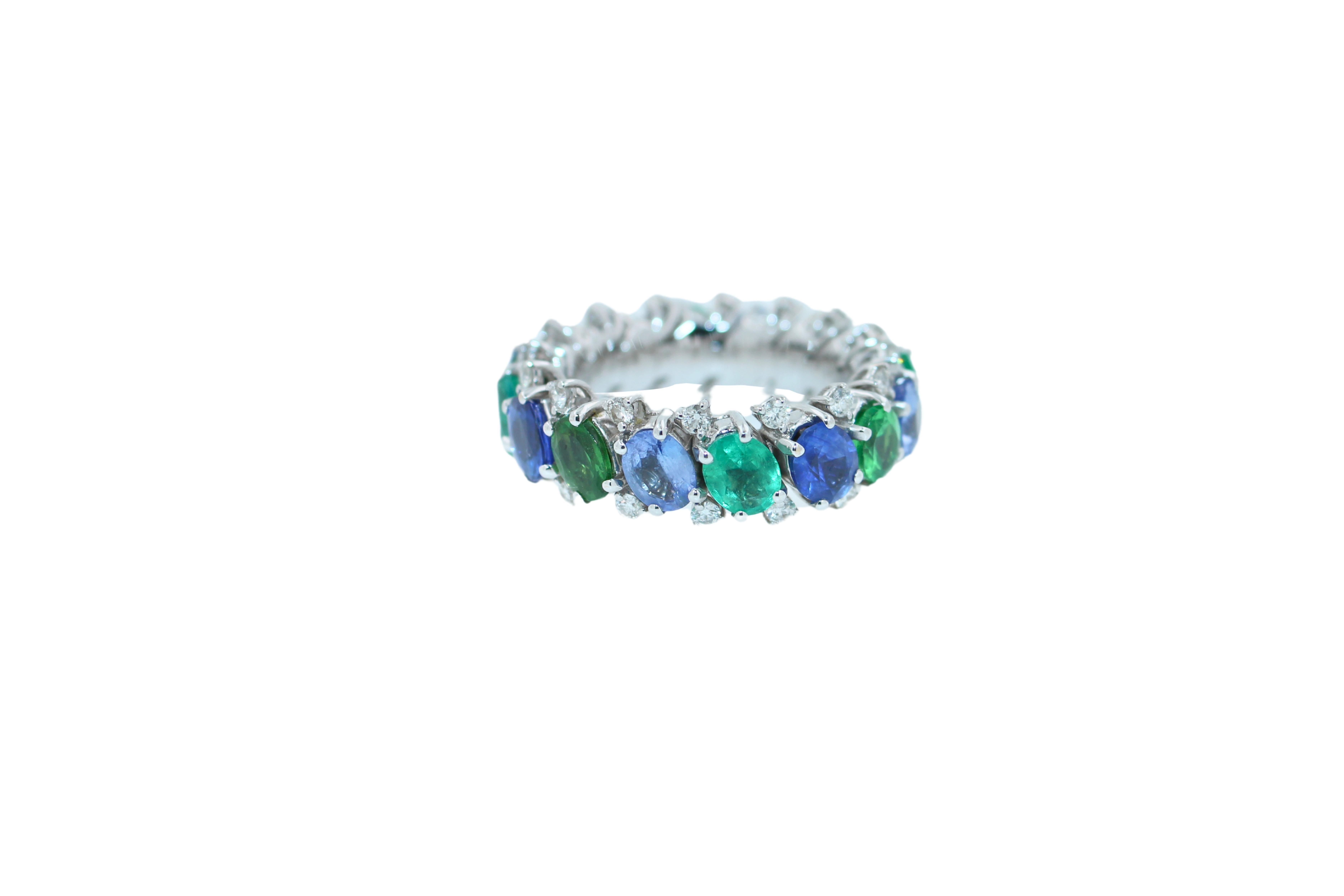 Oval Cut Diamond Emerald Sapphire Tsavorite Flexible Unique Eternity Band White Gold Ring For Sale