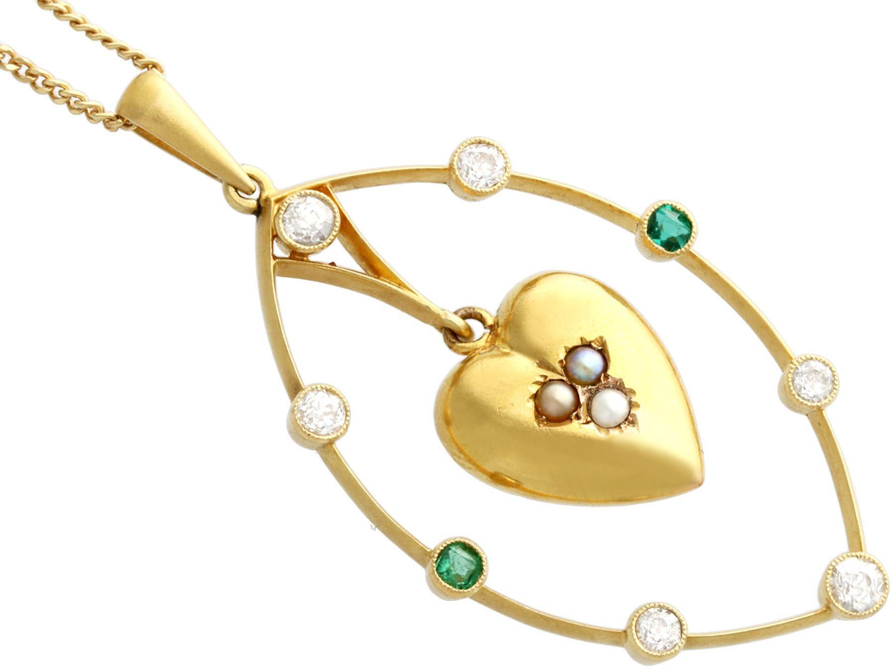 Round Cut Diamond, Emerald, Seed Pearl and Yellow Gold Heart Pendant